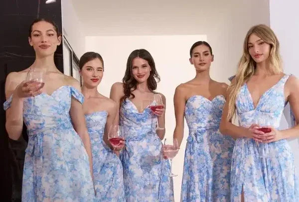 Beautiful ladies wearing Blue Floral Bridesmaid Dresses from Lady Black Tie collection