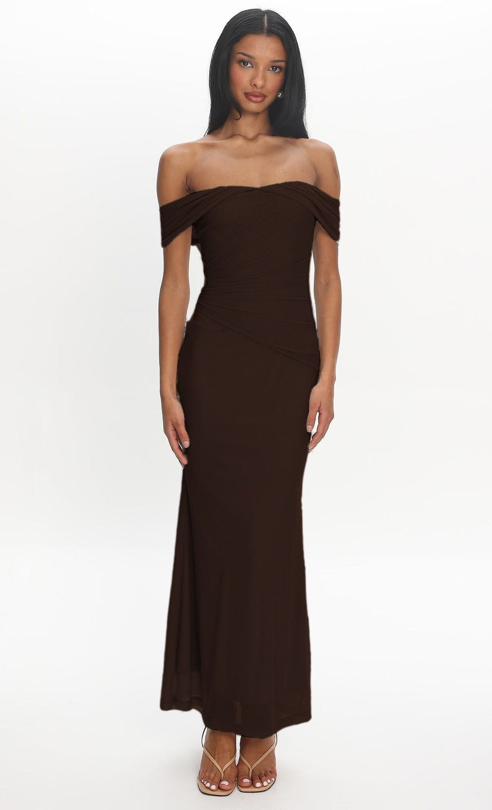 Model wearing the Sofia Maxi Dress in chocolate brown, front view showing the off-the-shoulder neckline, ruched mesh bodice and fitted floor-length silhouette