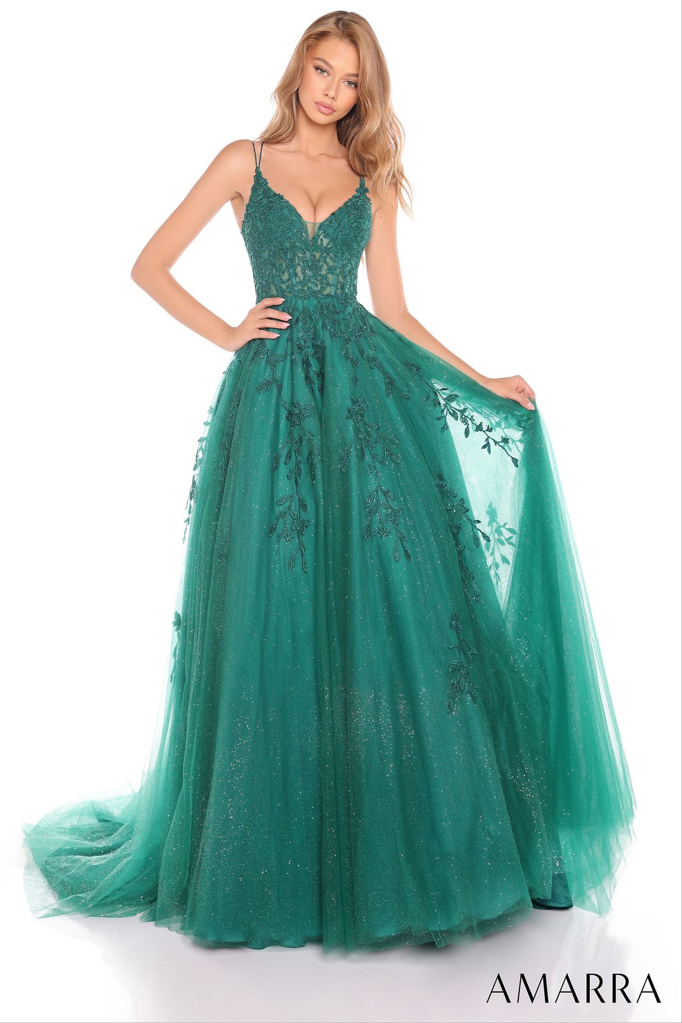 Green evening gown with intricate detailing on a white background, brand 'AMARRA' visible.