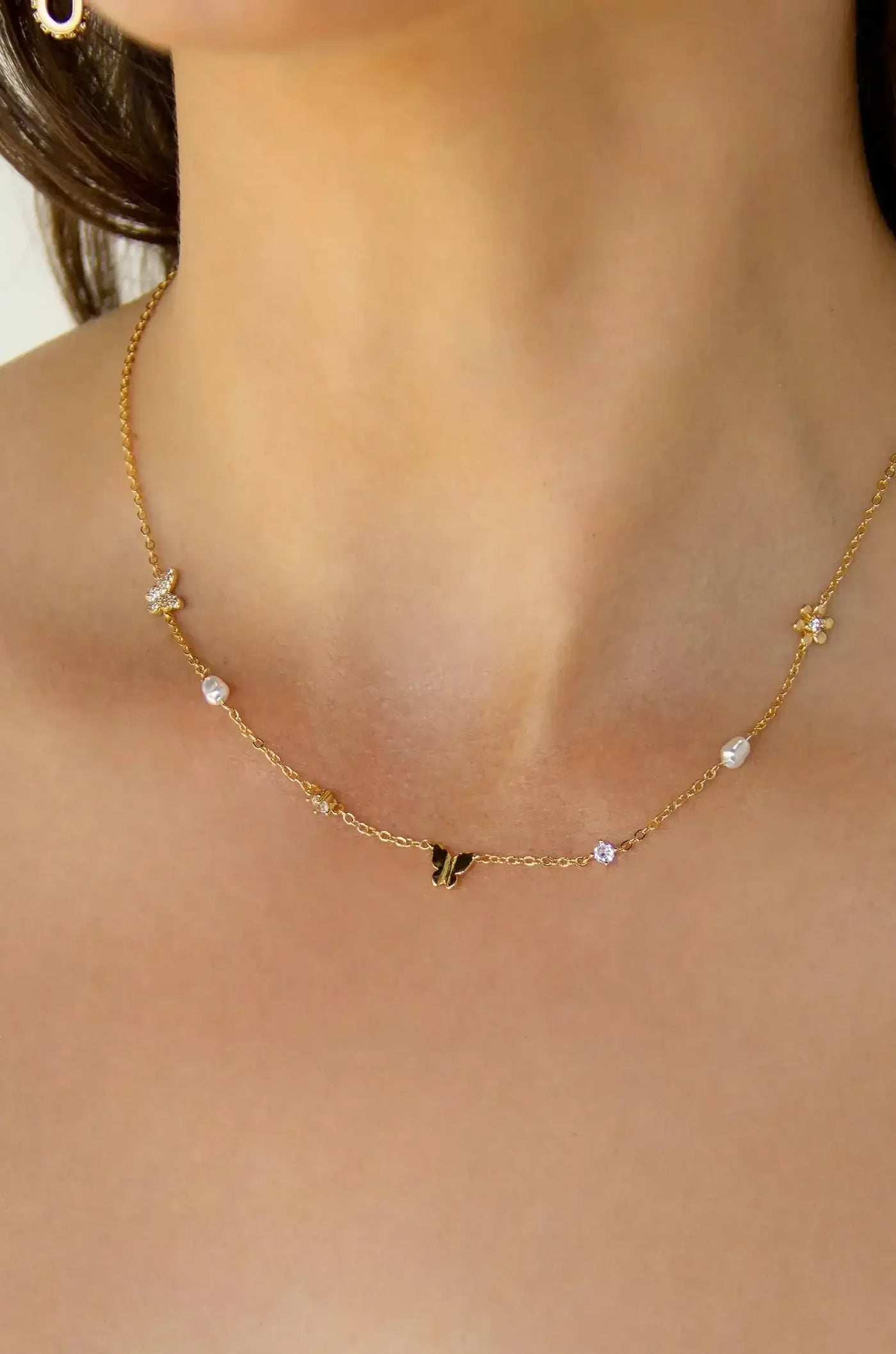 Subtle Butterflies and Pearl Necklace