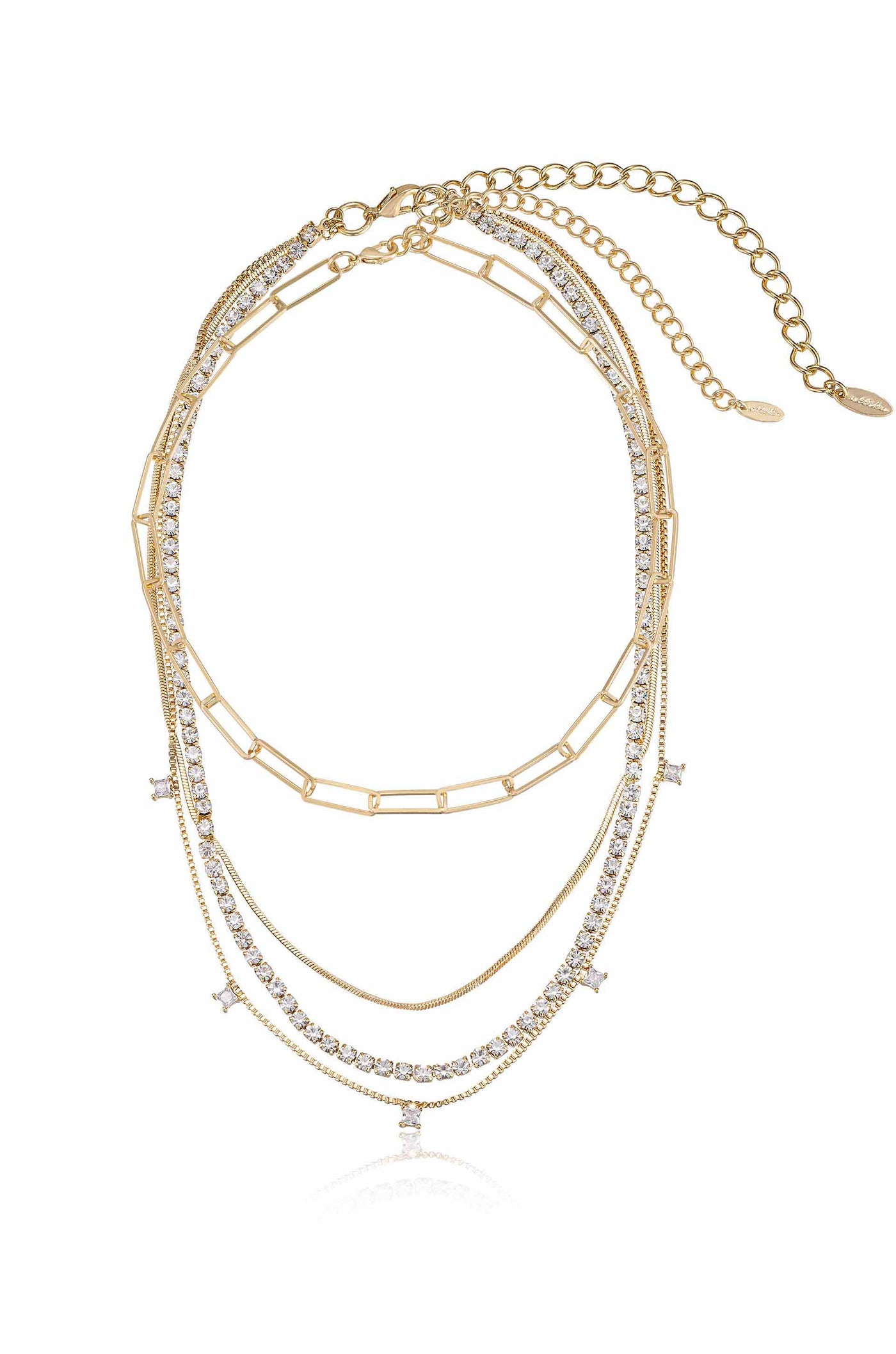 A layered gold necklace featuring multiple chains and sparkling crystals, elegantly displayed against a plain background, showcasing its intricate design and shine.