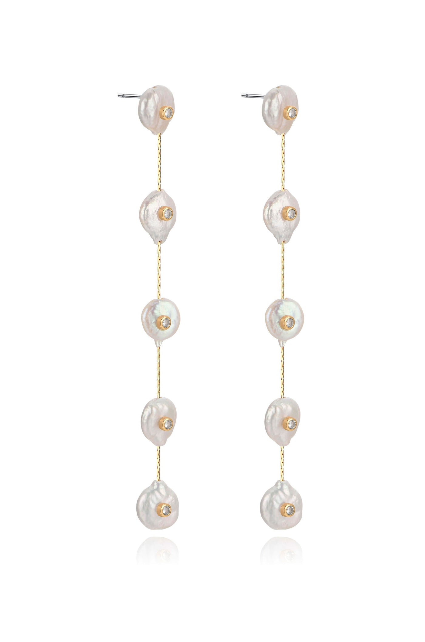 Dangling earrings feature multiple irregularly shaped pearls attached to a thin gold chain, reflecting soft light against a simple white background, emphasizing their elegance and craftsmanship.