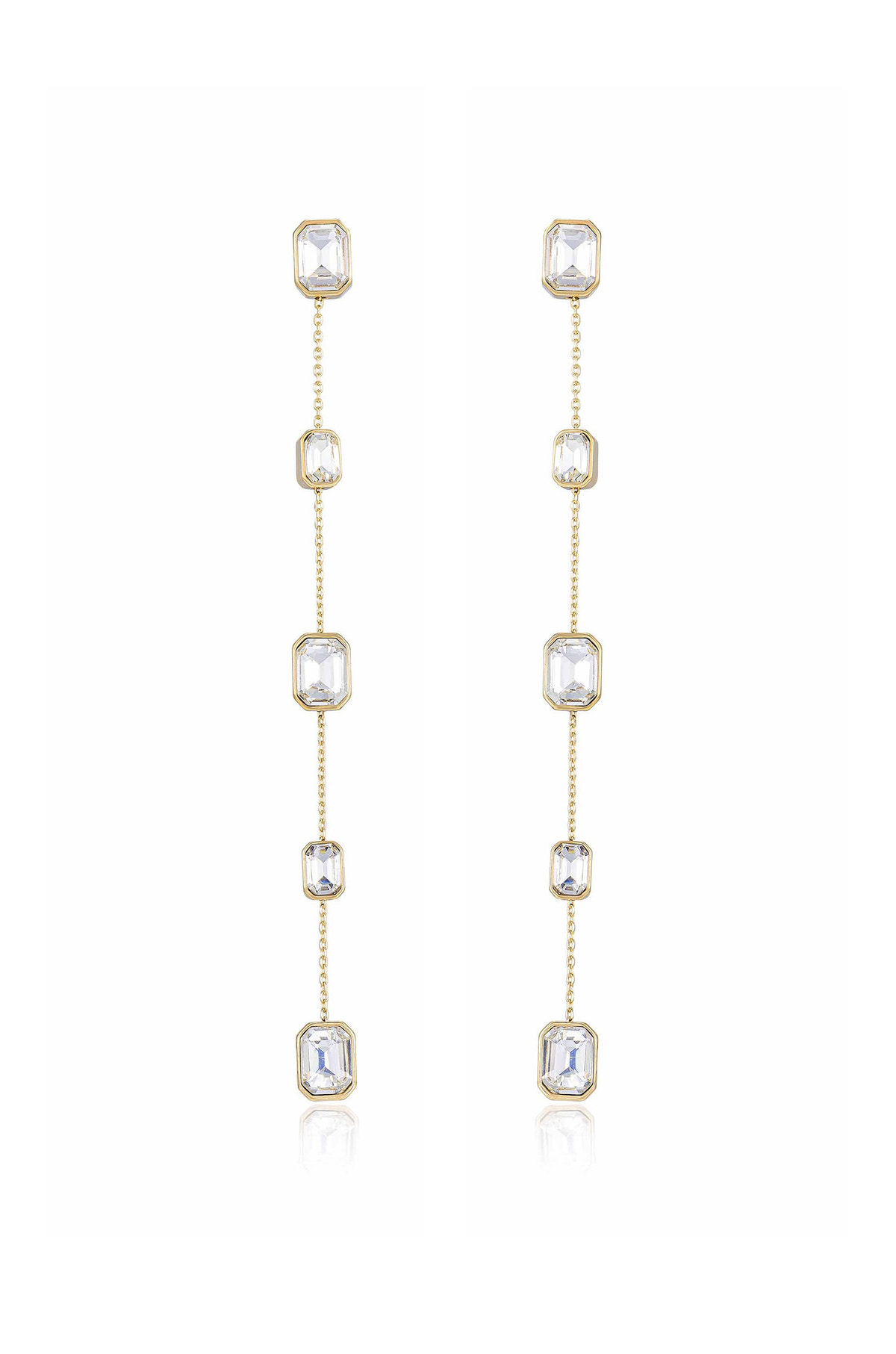Gold dangle earrings feature multiple clear octagonal crystals linked by delicate chains, showcasing elegance and shine. They stand against a neutral background, highlighting their refined design and sparkle.