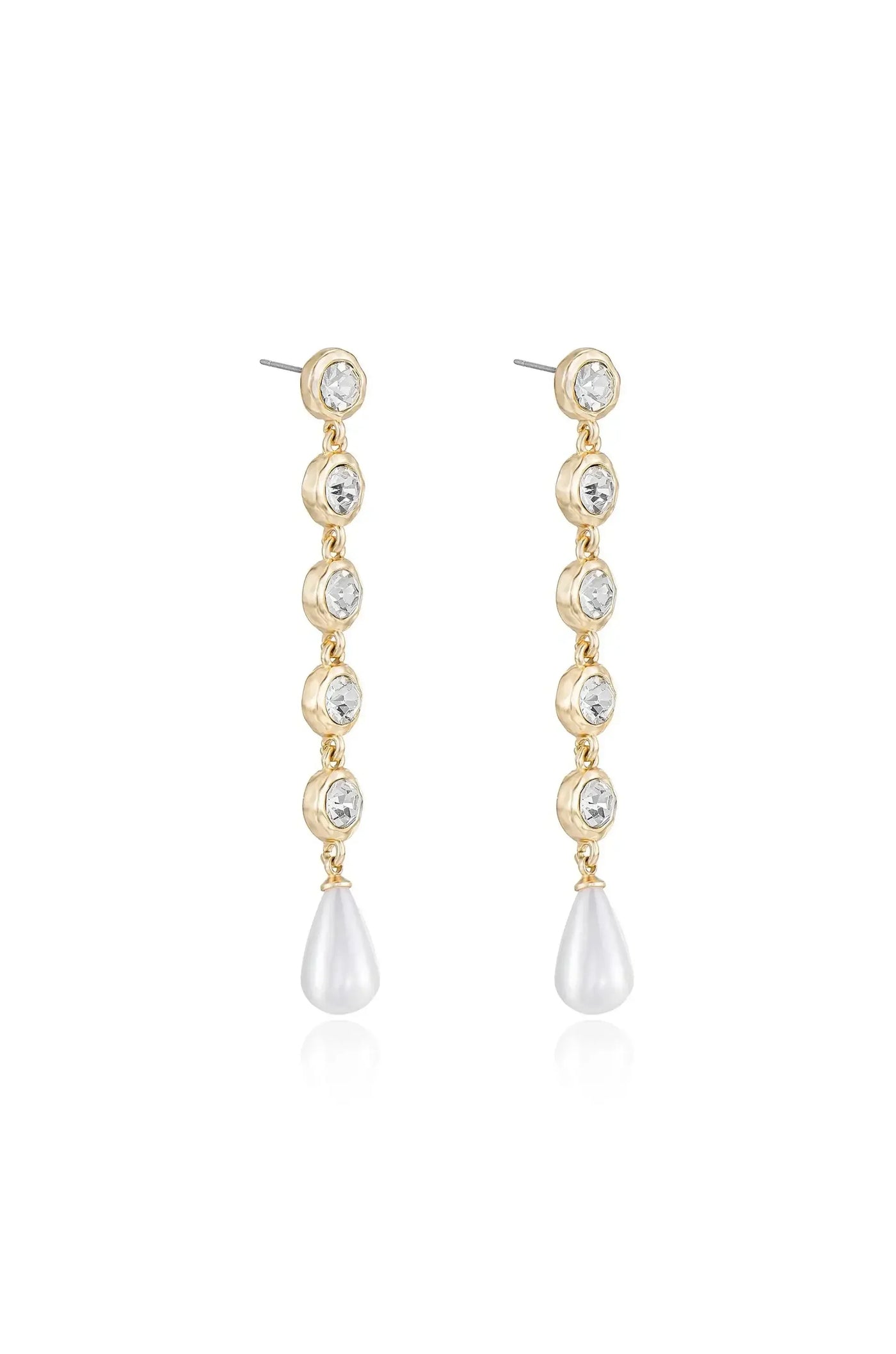 Dangling earrings feature a sequence of sparkling clear gemstones set in gold, culminating in a teardrop pearl at the bottom. The background is neutral, emphasizing the jewelry's elegance.