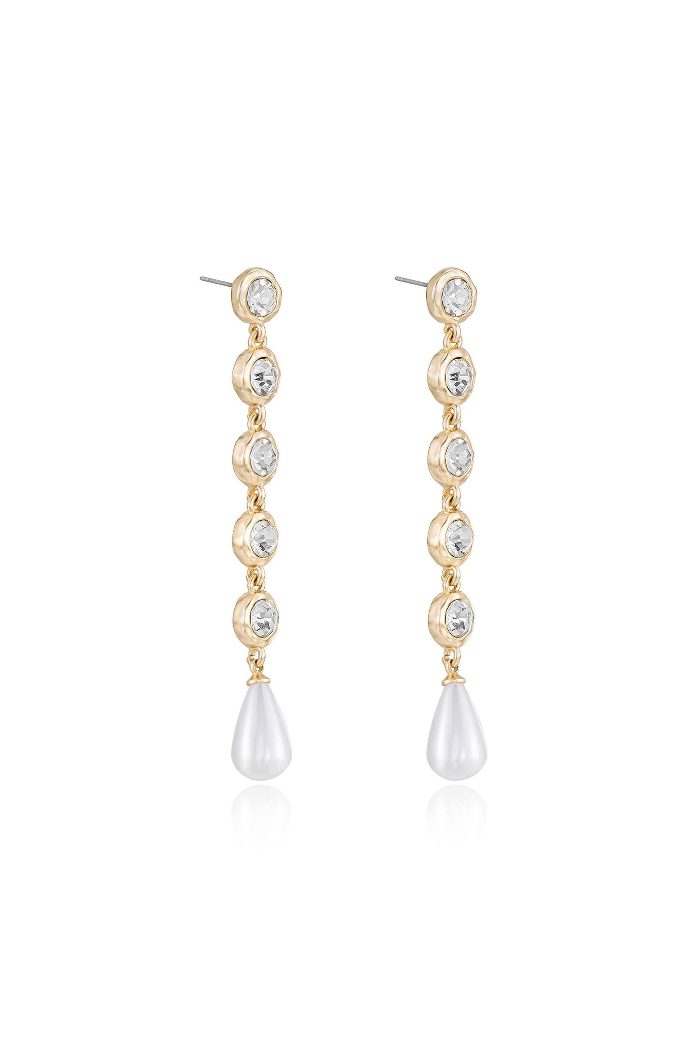 Dangling earrings feature a sequence of sparkling clear gemstones set in gold, culminating in a teardrop pearl at the bottom. The background is neutral, emphasizing the jewelry's elegance.