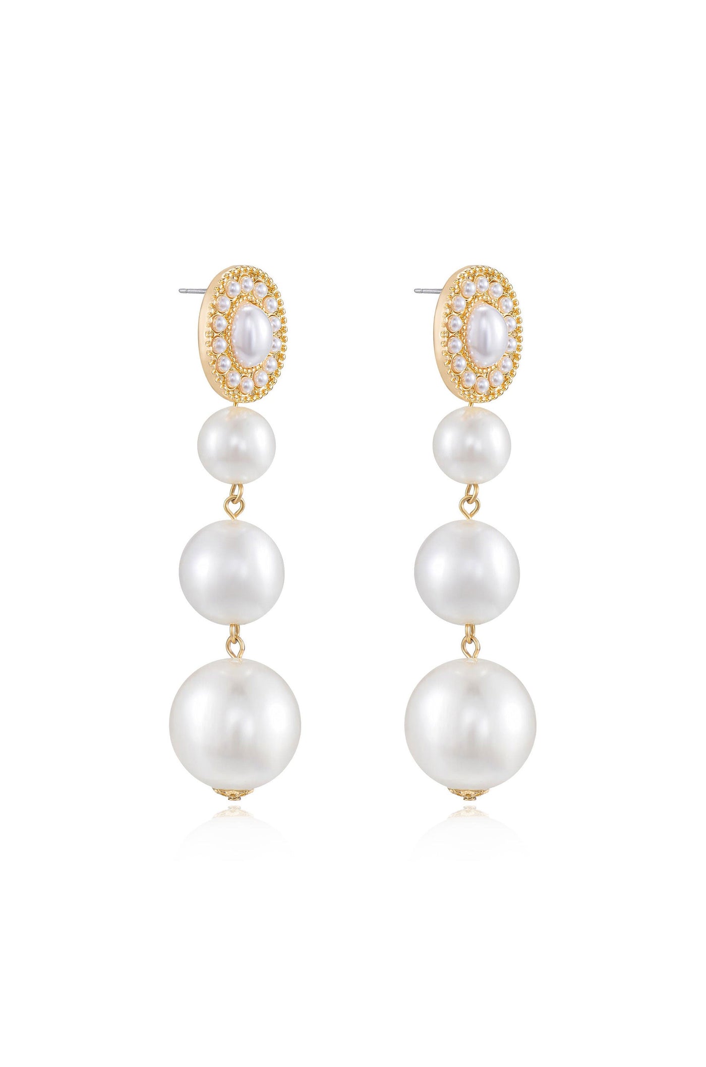 Elegant earrings featuring a cluster of pearls and a gold oval setting. The pearls are arranged in a descending pattern, capturing light and reflecting sophistication.