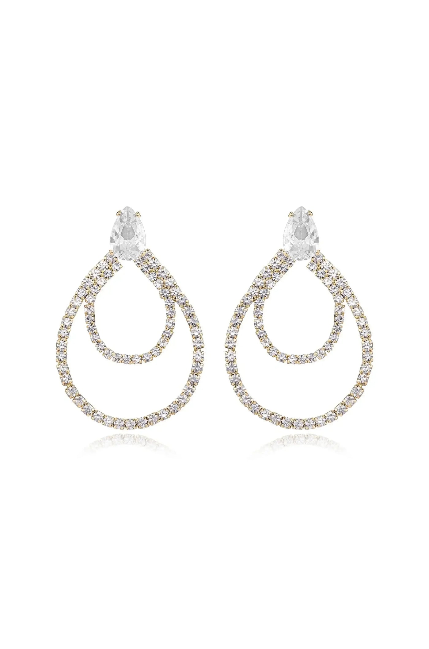Two elegant gold and clear crystal earrings hang symmetrically. They feature a teardrop design with intricate loops, set against a plain background, showcasing their shiny, reflective surface.