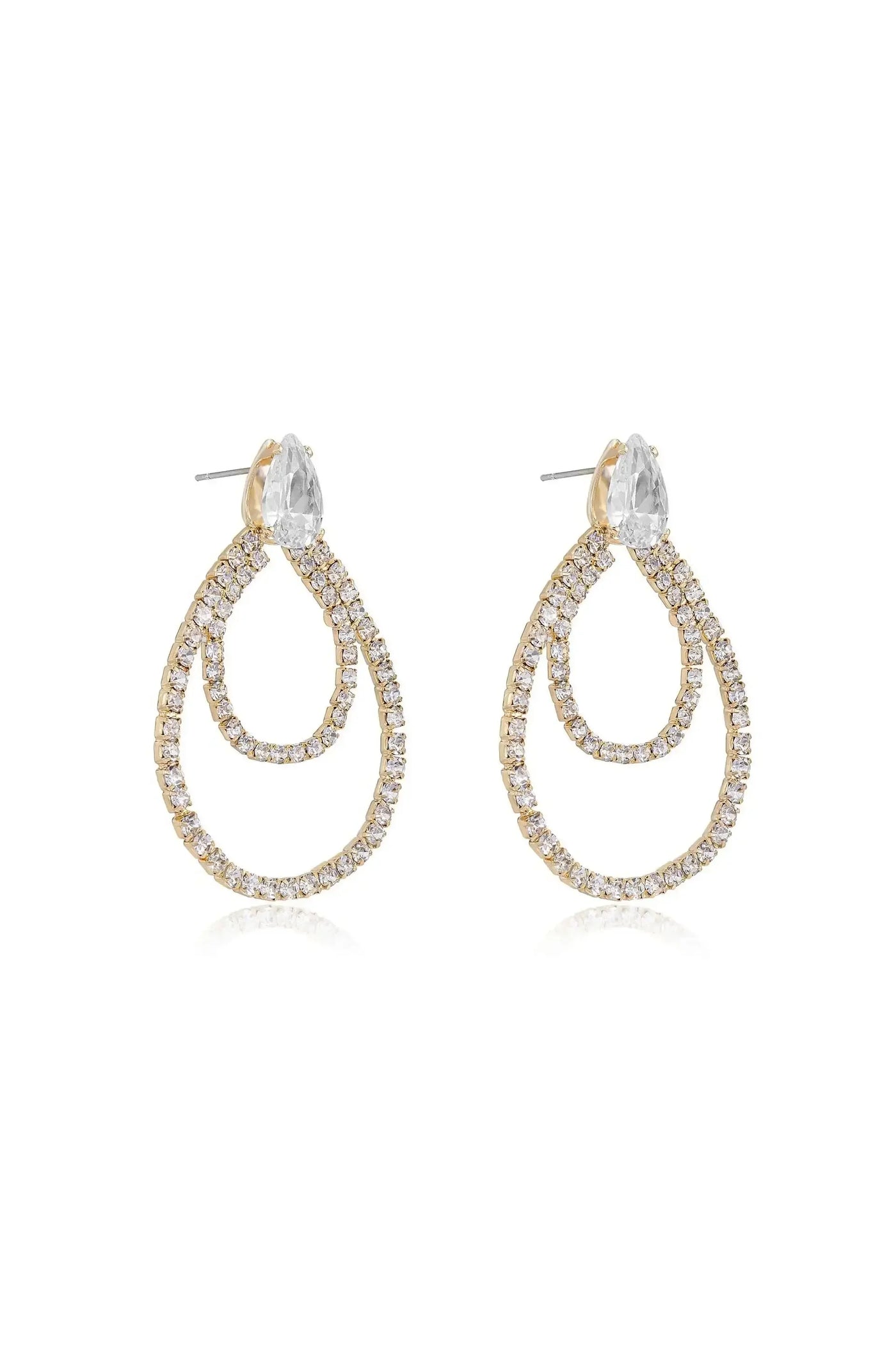 Gold teardrop earrings are displayed, featuring multiple intertwined loops adorned with sparkling clear crystals. They are set against a clean white background, highlighting their elegant design.
