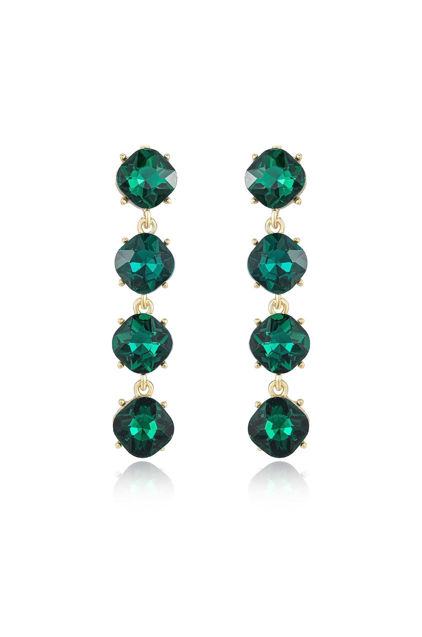 Long, elegant earrings feature five green gemstones, each encased in gold metal settings. They hang vertically, reflecting light, against a plain white background, emphasizing their color and sparkle.
