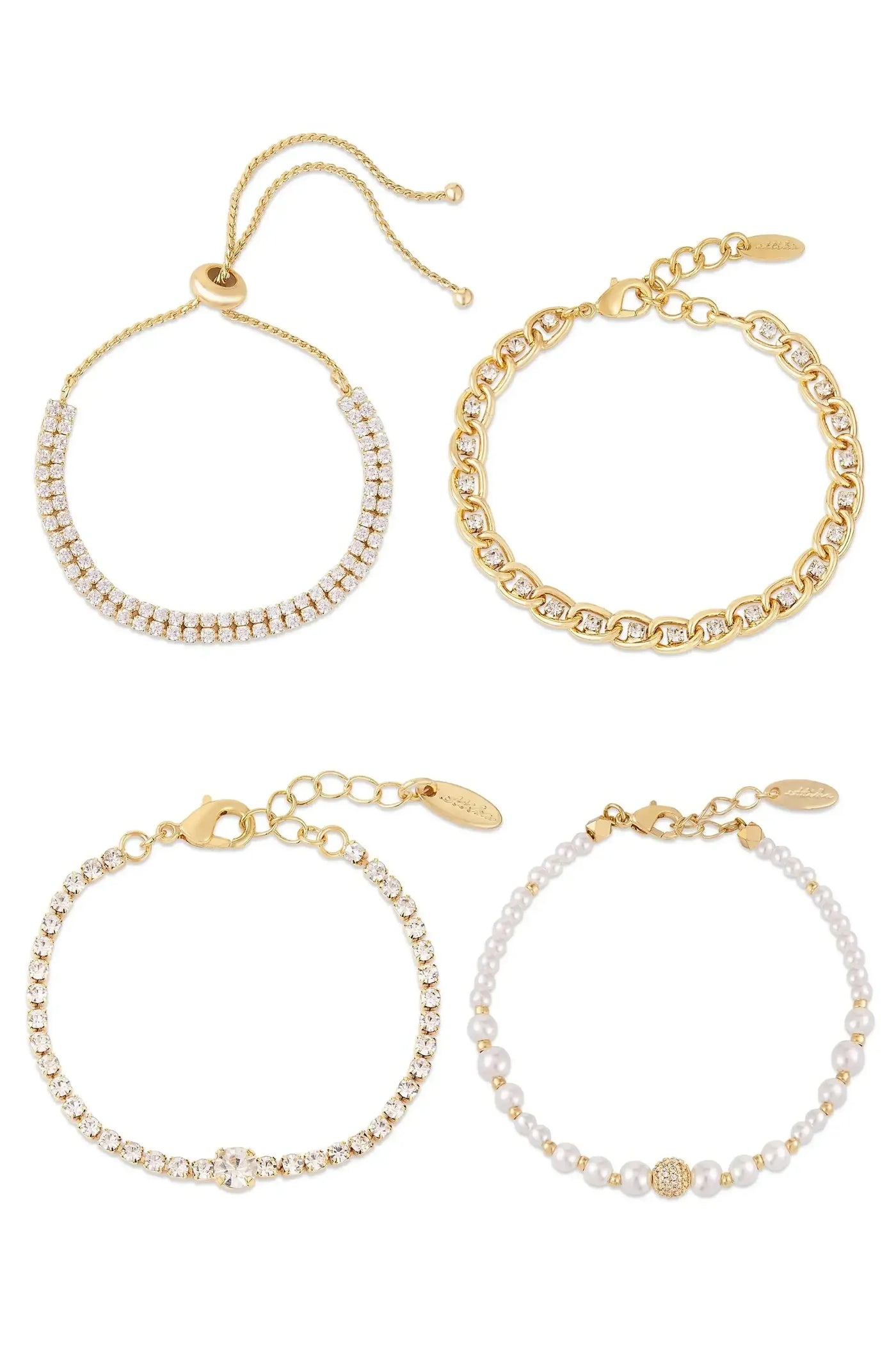 Four bracelets are displayed: a gold chain bracelet, a sparkling rhinestone bracelet, a pearl bracelet with a decorative gold bead, and a thin bracelet with a shiny centerpiece, all arranged neatly.