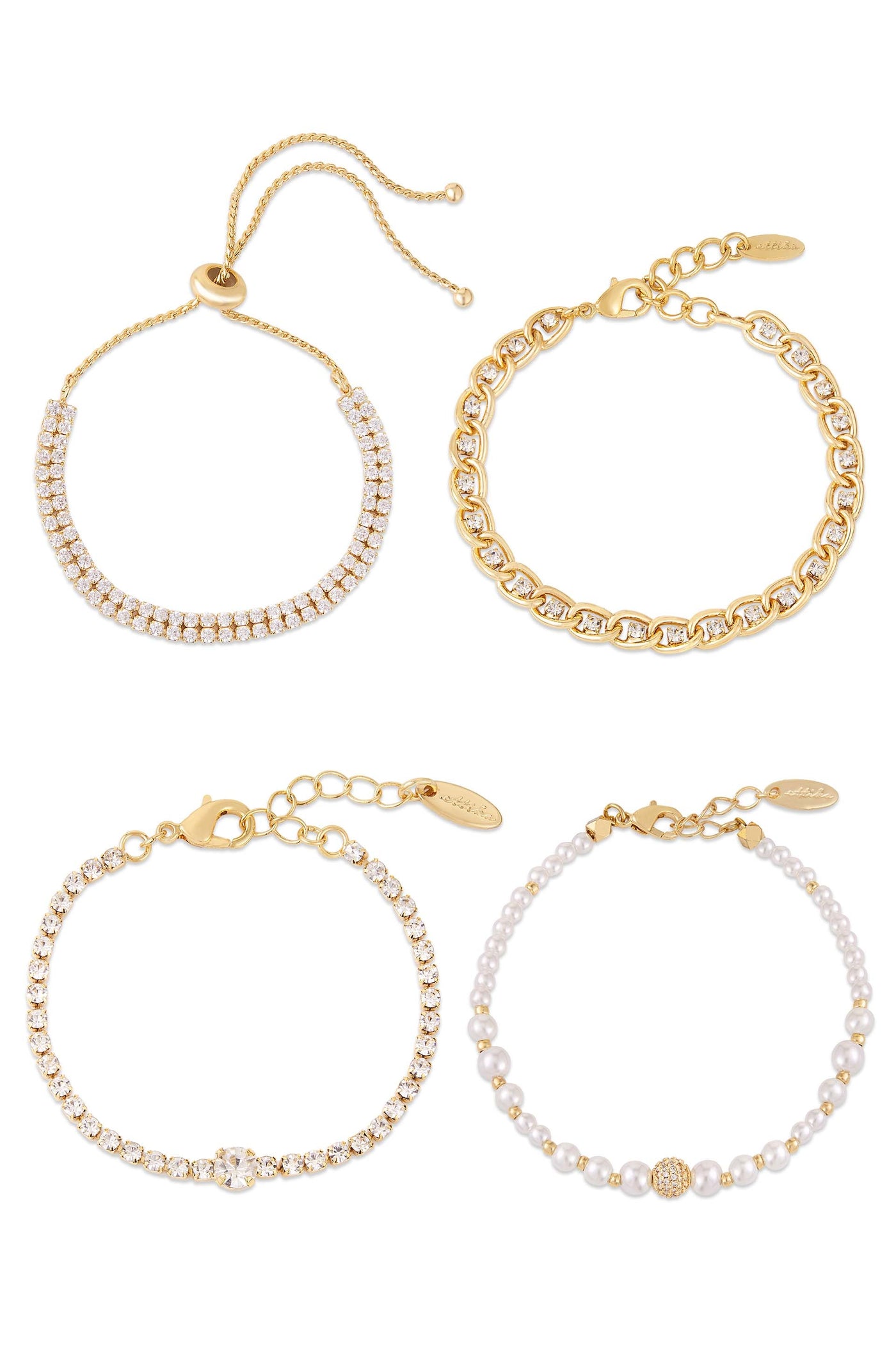 Four bracelets are displayed: a gold chain bracelet, a sparkling rhinestone bracelet, a pearl bracelet with a decorative gold bead, and a thin bracelet with a shiny centerpiece, all arranged neatly.
