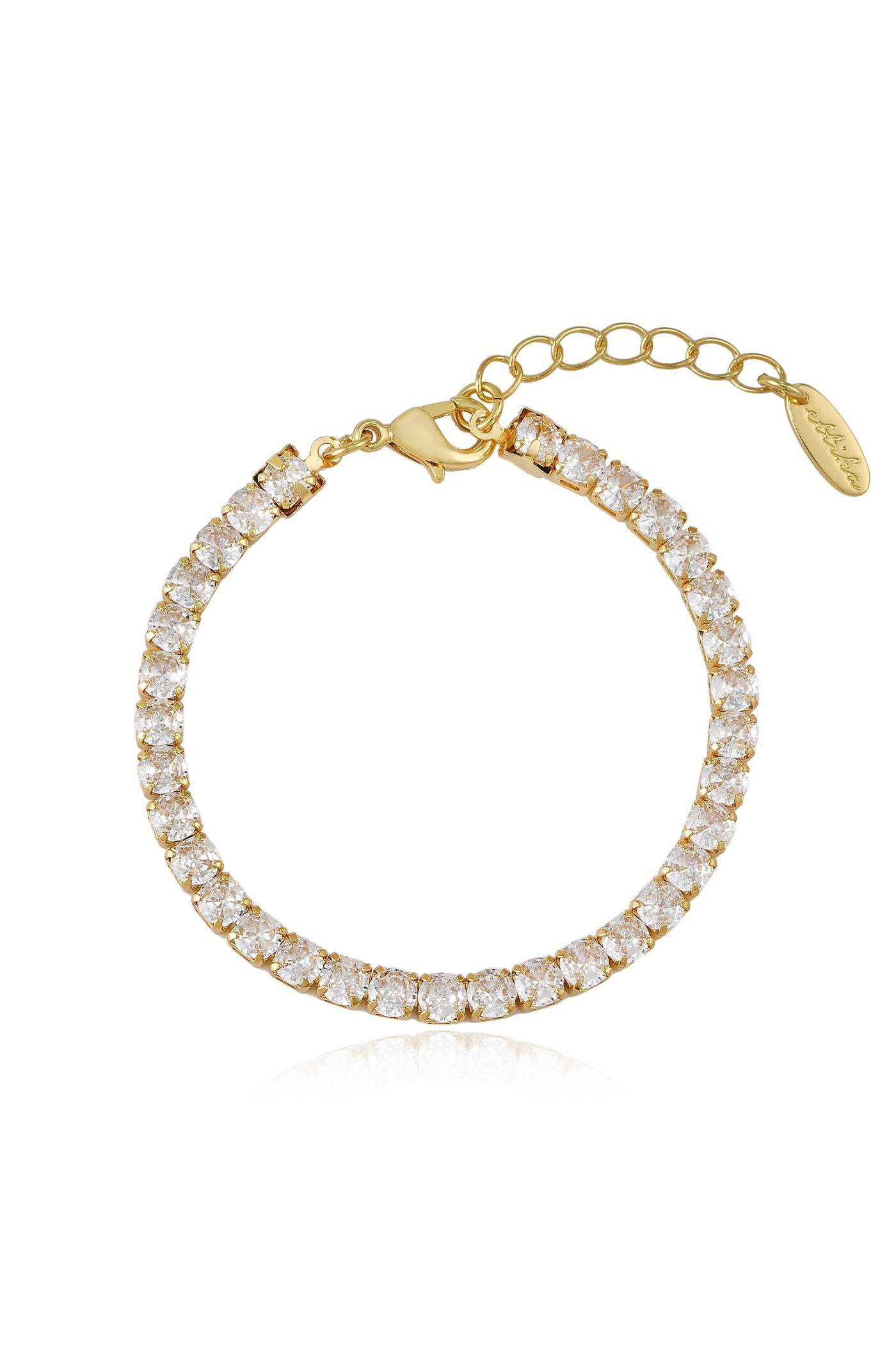 A gold bracelet adorned with sparkling clear stones is displayed, featuring a clasp and an extension chain, emphasizing its elegant design and luxurious appeal in a clean, white background.