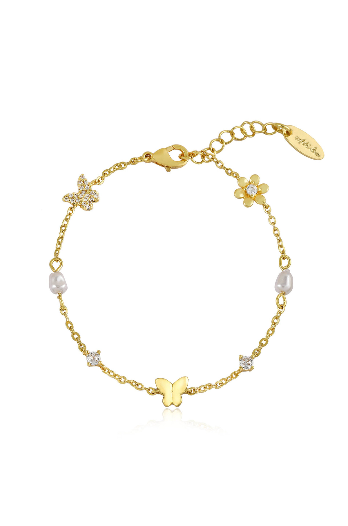 A delicate gold bracelet features intricate butterfly and flower charms, with sparkling crystals and pearls. It is showcased against a clean, white background, emphasizing its elegance and detail.