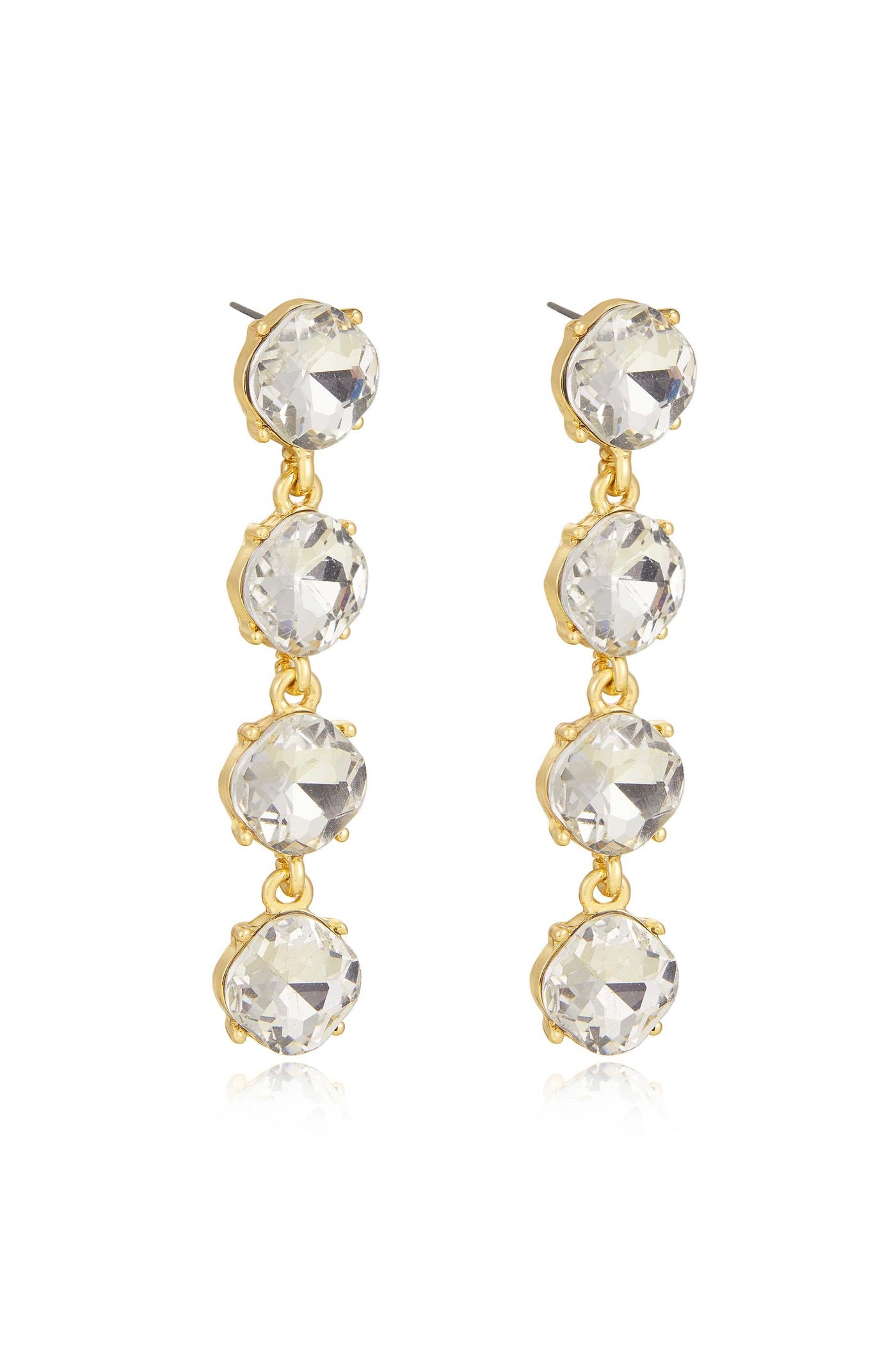 Dangling earrings made of gold-tone metal feature three large, round, faceted crystals stacked vertically. They reflect light and add sparkle, suitable for formal or festive occasions.