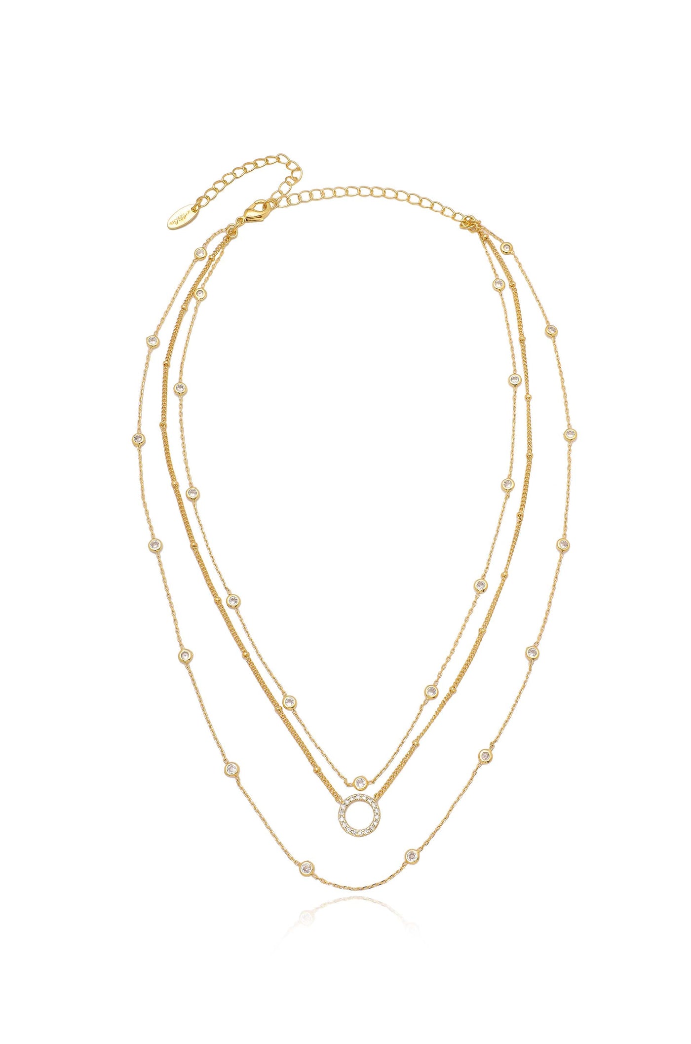 A delicate gold necklace features multiple strands adorned with small circular beads and a central ring, showcasing a sparkling design against a clean, white background.