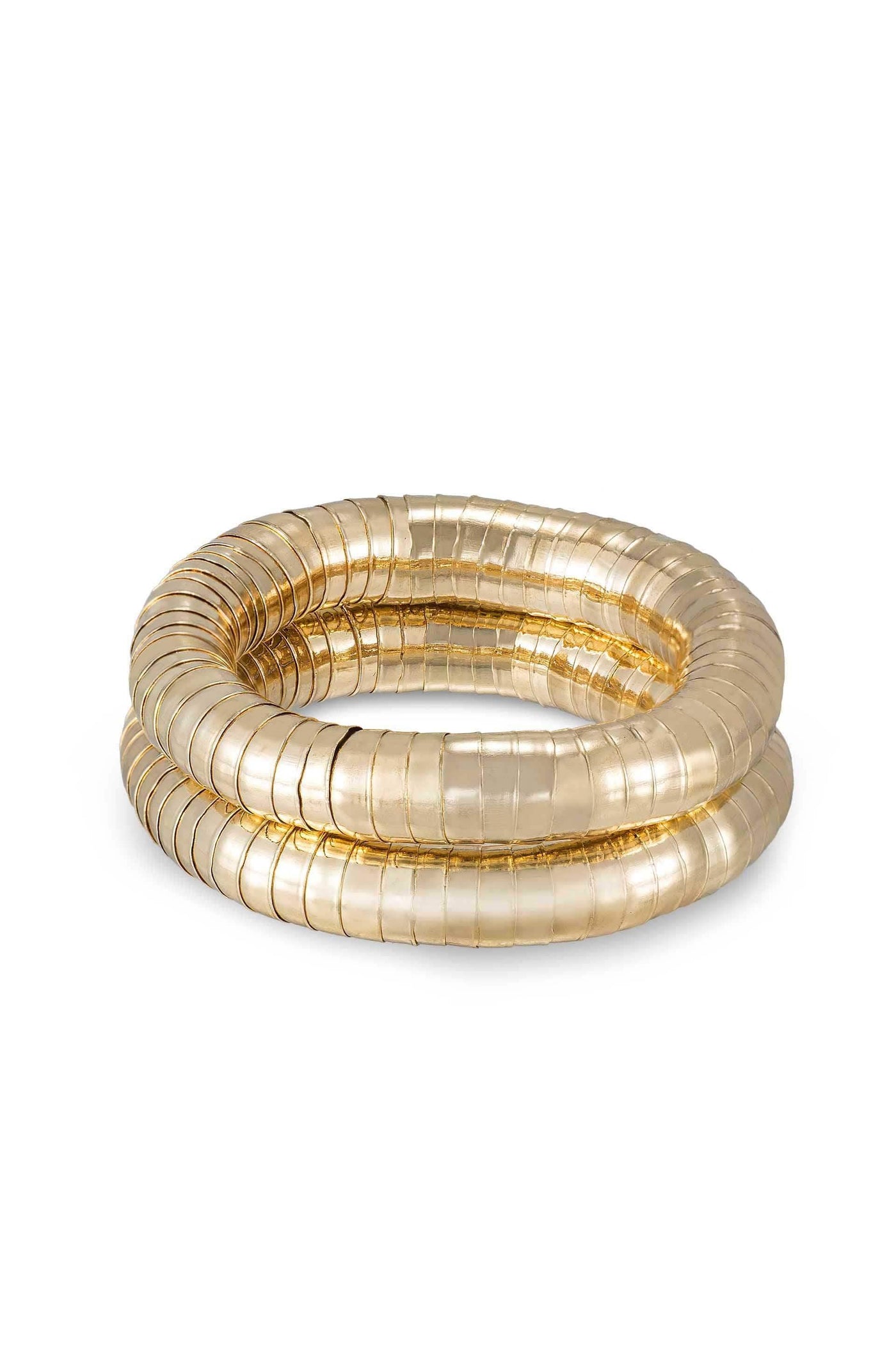 A three-loop gold-toned bracelet made of linked, flat segments sits on a plain white background, showcasing its reflective surface and elegant design. It appears modern and stylish.