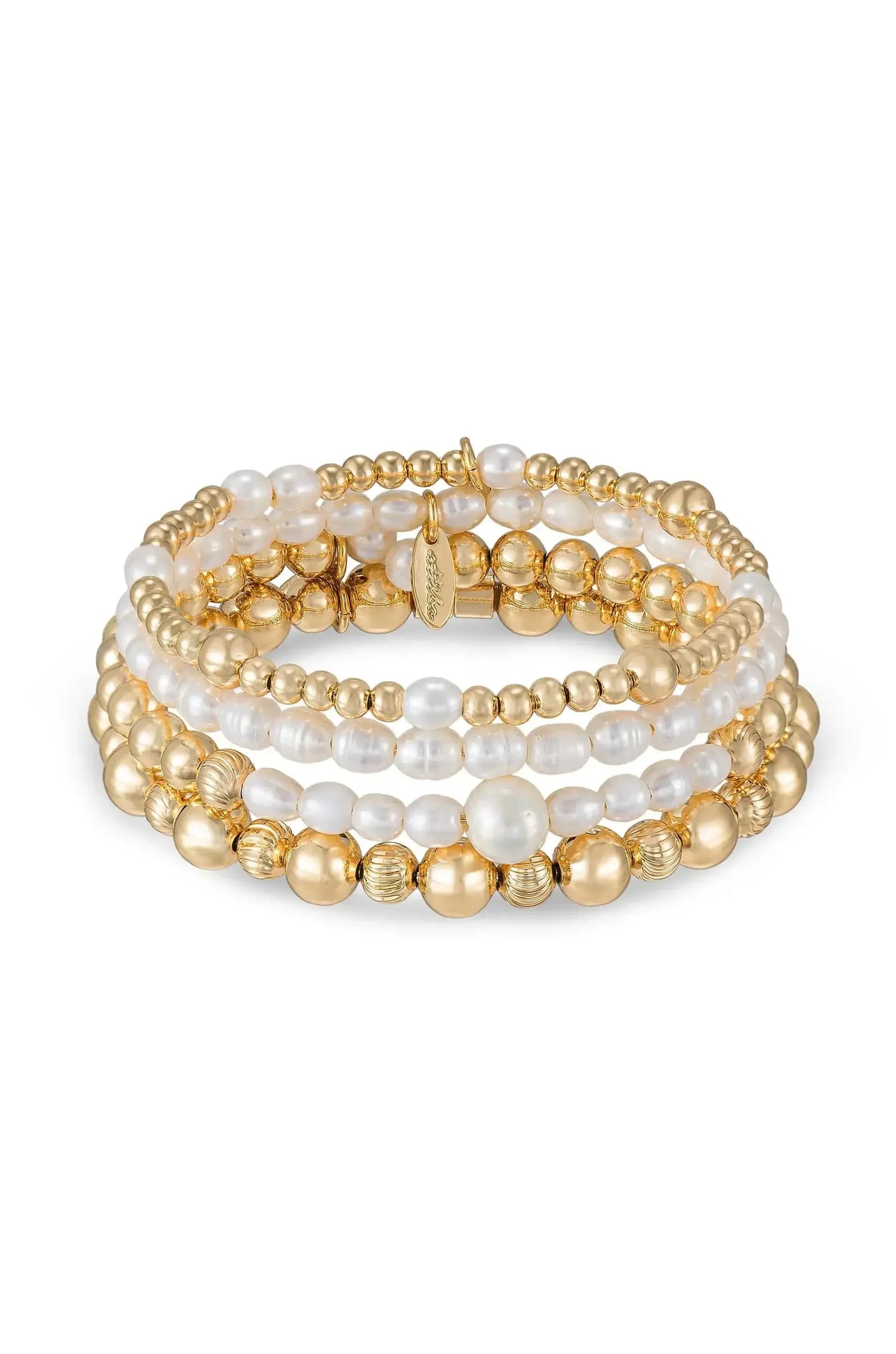 A multi-strand bracelet made of alternating golden beads and white pearls is displayed elegantly. The strands are layered together, giving a rich, textured appearance that suggests luxury and style.