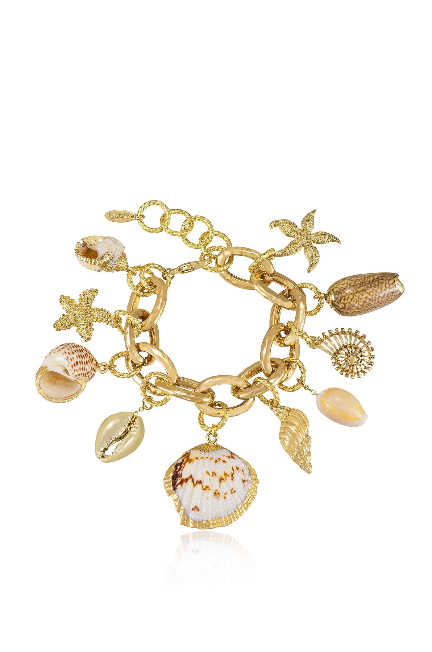 A gold-tone charm bracelet features multiple sea-inspired charms, including shells and a starfish. The piece is presented on a plain, light background, emphasizing its decorative elements.