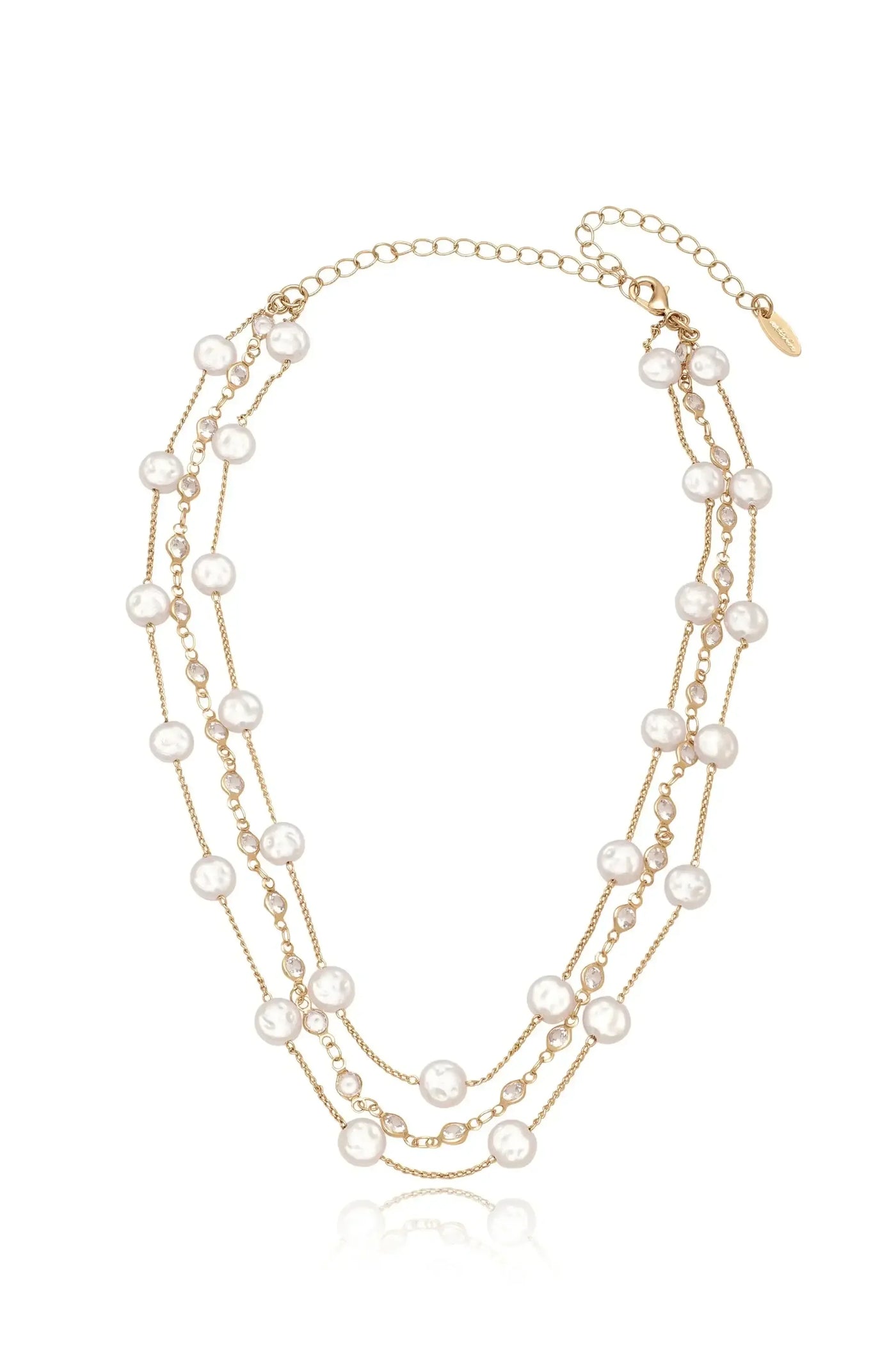 A layered gold necklace featuring multiple strands adorned with round, white pearls and small sparkling gemstones, displayed against a plain background, reflecting light to emphasize its shine and elegance.
