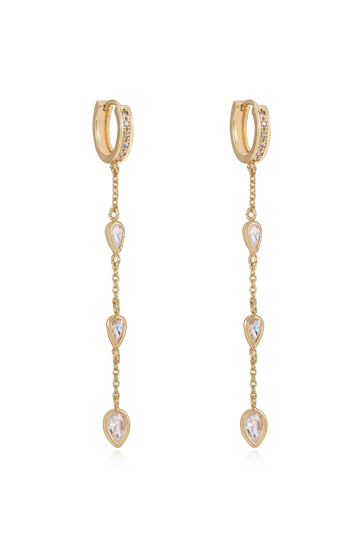 Elegant gold earrings feature a hoop design adorned with small crystals, from which three dangling teardrop-shaped gemstones descend, reflecting light against a neutral background.
