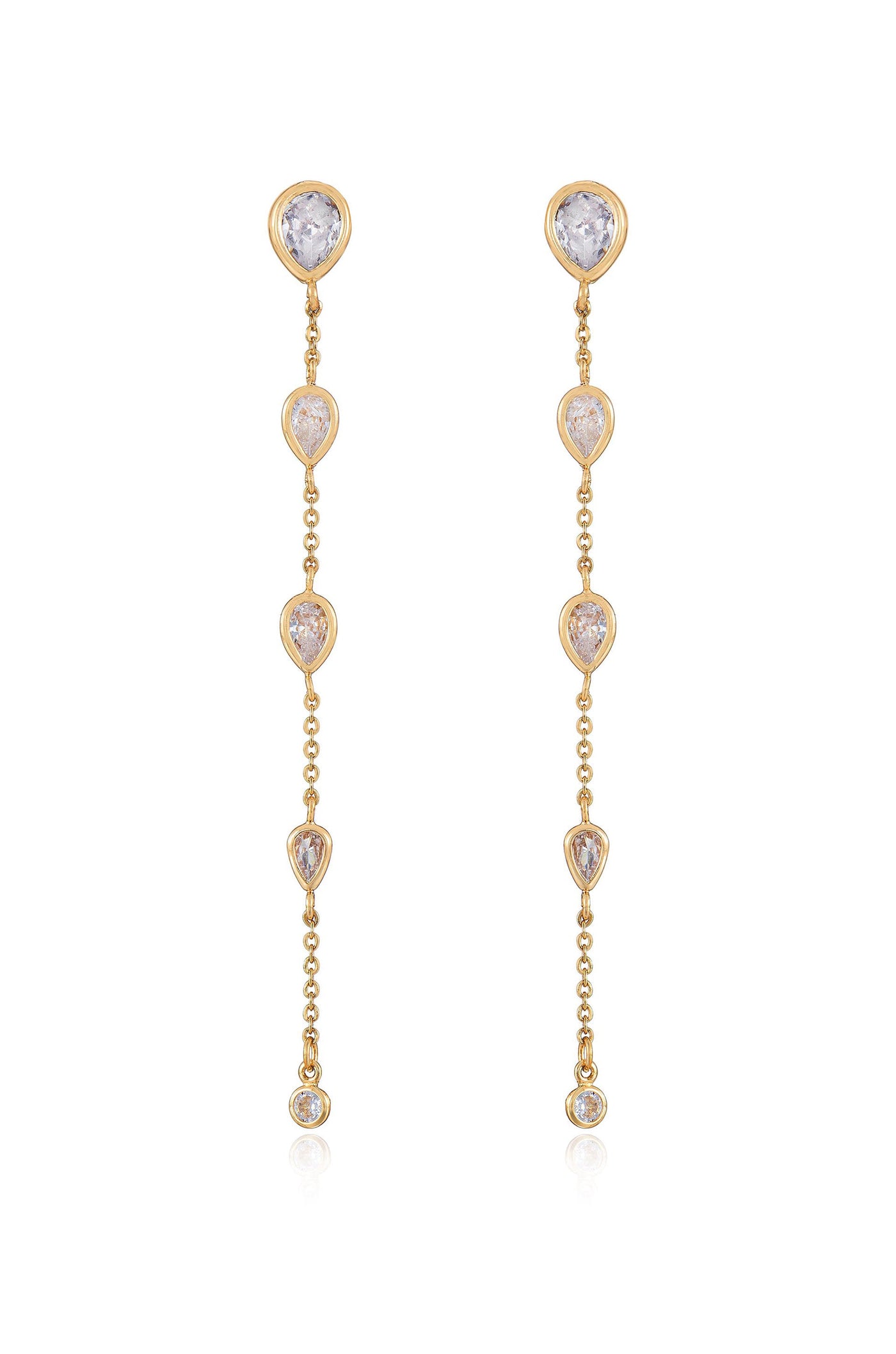 Gold earrings feature a linear design with alternating teardrop-shaped gemstones and circular accents. The earrings hang down, reflecting light elegantly in a neutral background.