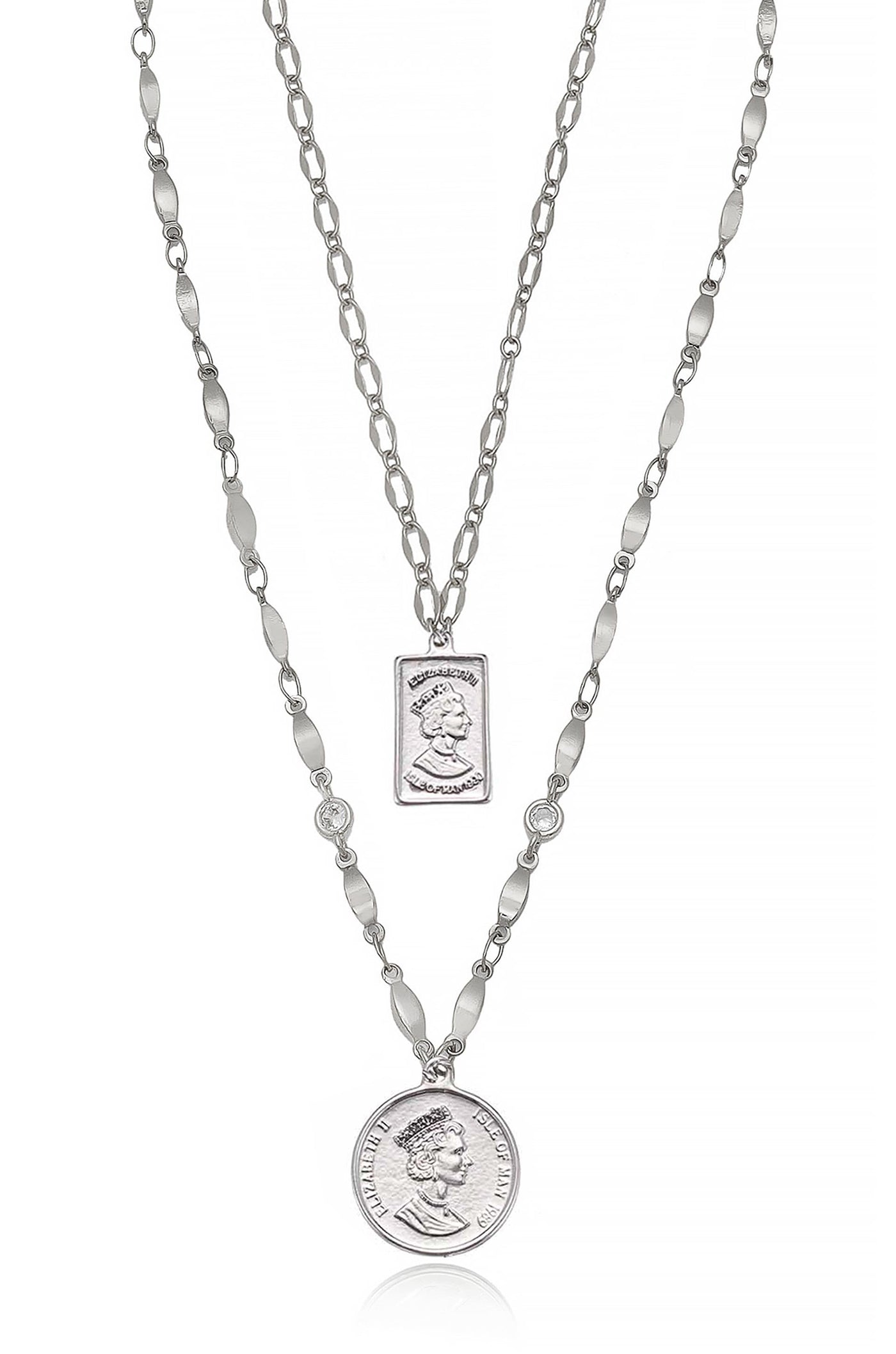 A silver necklace features two chains; one holds a rectangular pendant with a profile and the other has a round coin pendant. Both pendants depict a monarch's likeness.