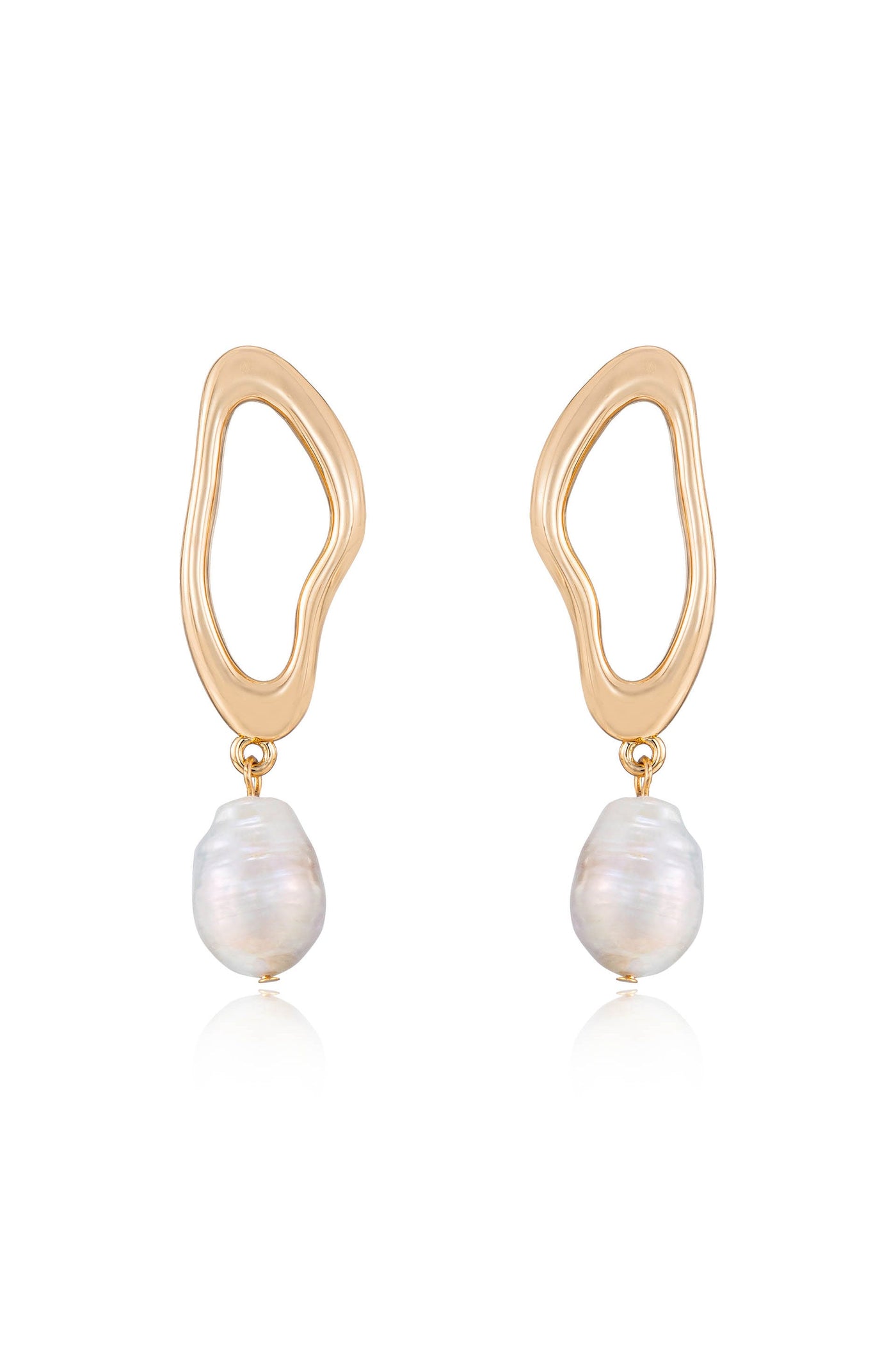 Gold earrings are displayed, featuring an abstract, wavy design with a drop section holding a smooth, white pearl. The background is neutral, enhancing the jewelry's elegance.