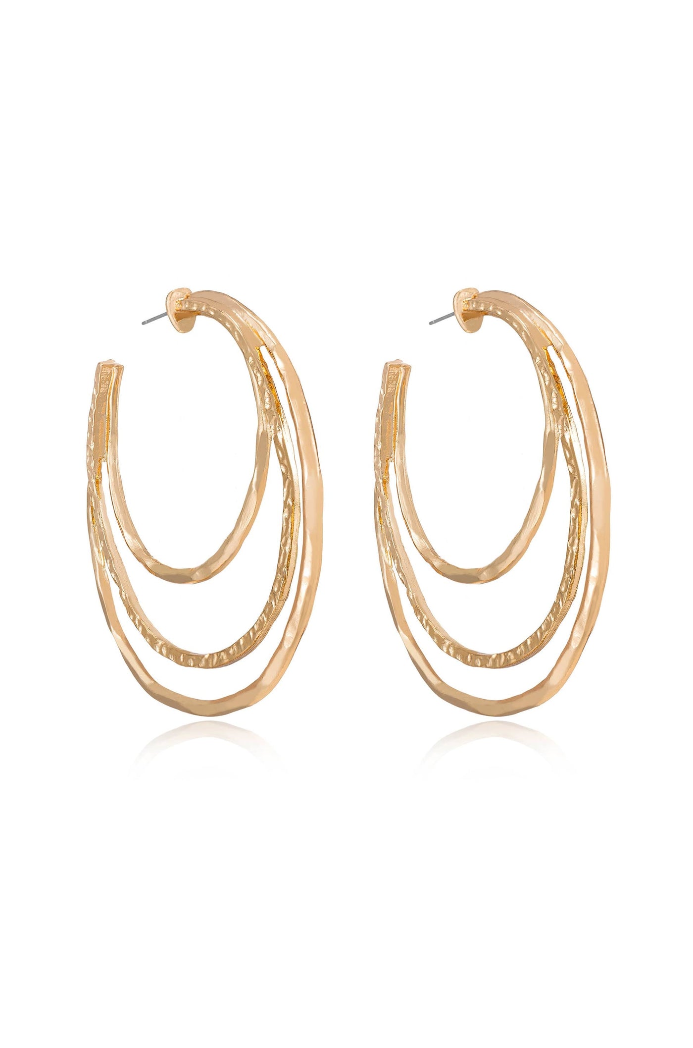 A pair of gold hoop earrings featuring three layered, curved designs. They are displayed against a reflective surface, highlighting their shine and textured details.