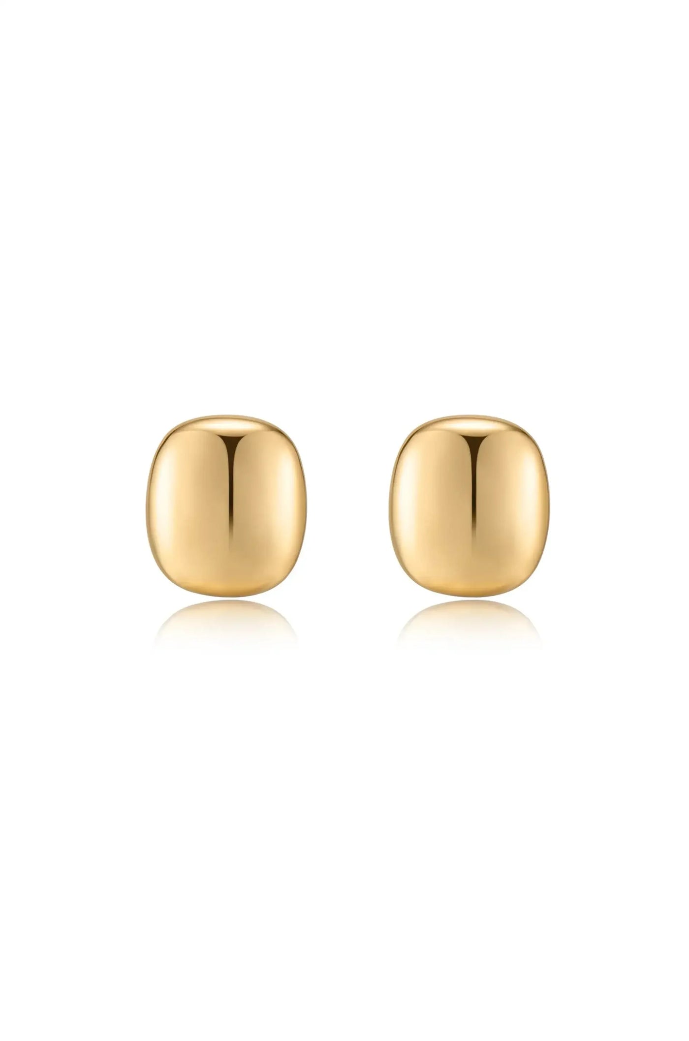 Two glossy, rounded gold earrings sit side by side, reflecting light. They are displayed against a plain white background, emphasizing their simplicity and elegance.
