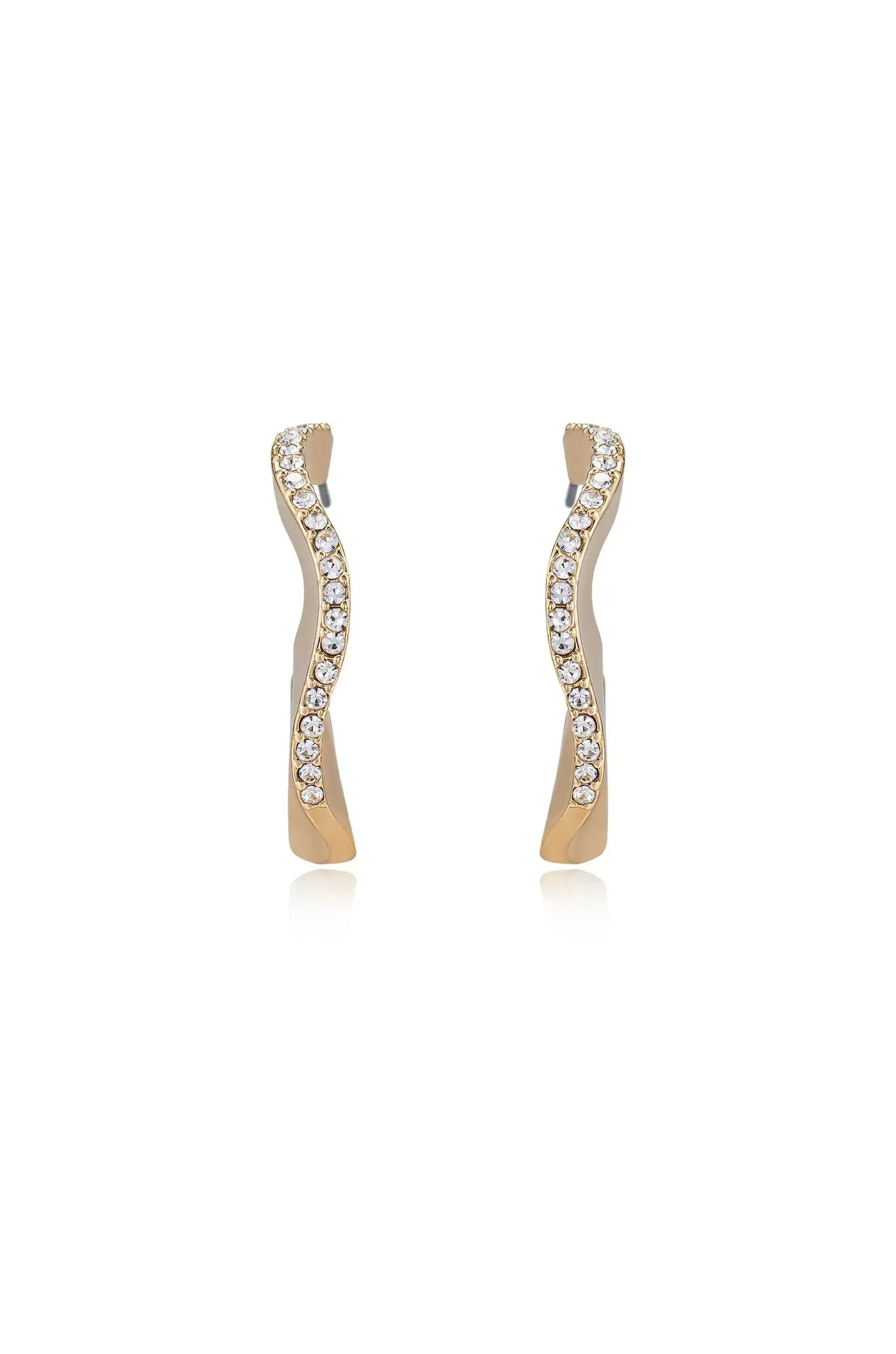 Gold earrings with a wavy design are displayed upright. Each earring features a line of sparkling clear stones along one side, emphasizing their elegant style against a plain background.