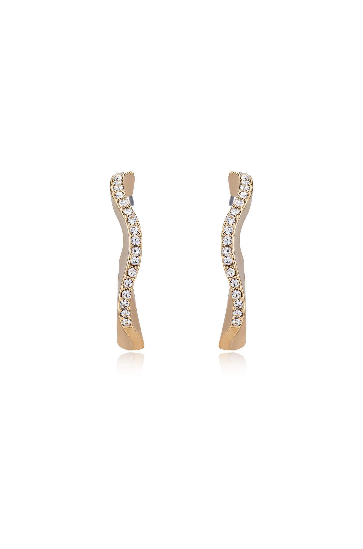 Gold earrings with a wavy design are displayed upright. Each earring features a line of sparkling clear stones along one side, emphasizing their elegant style against a plain background.
