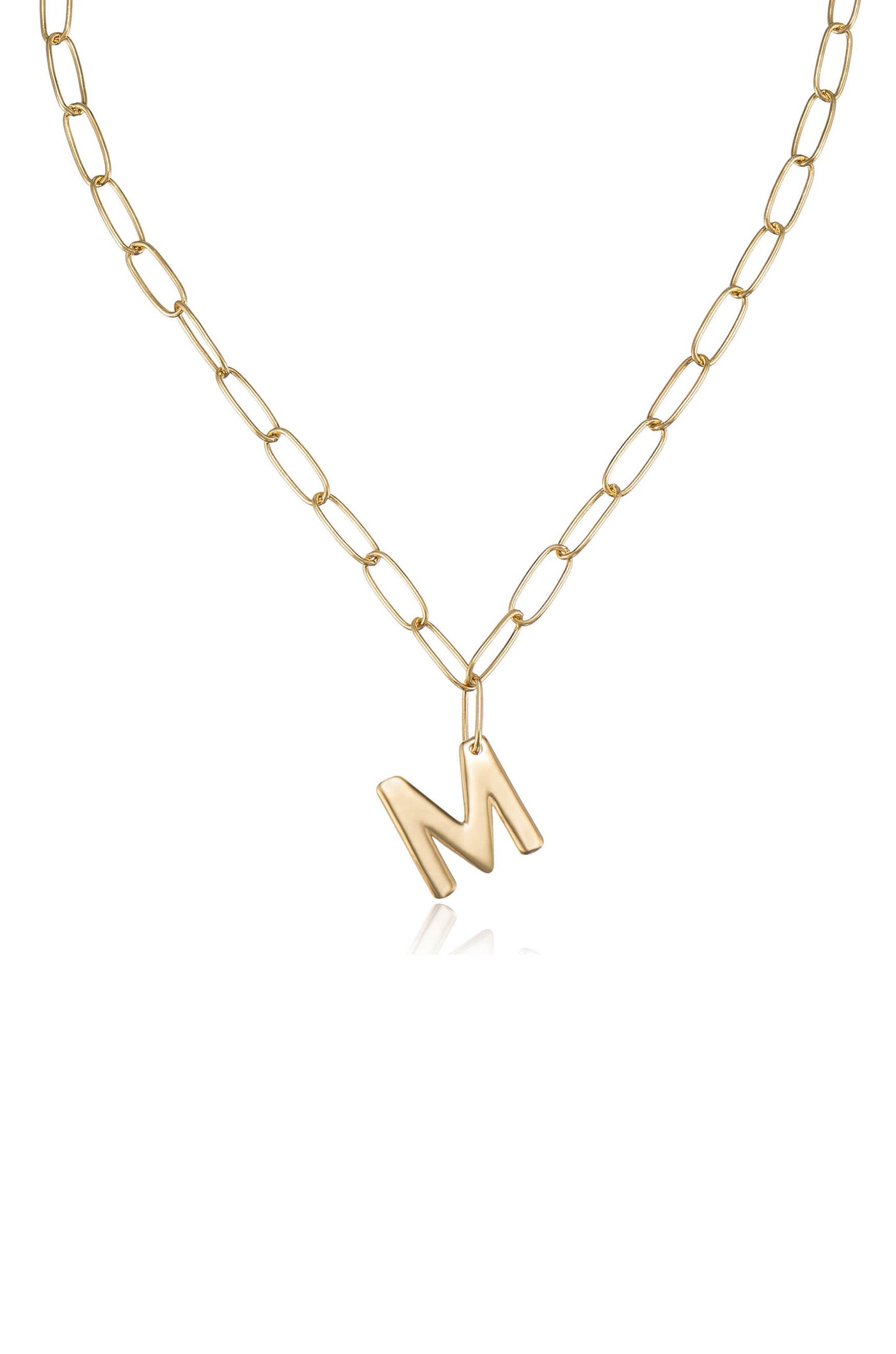 A gold chain necklace features an asymmetrical letter "M" pendant hanging from it. The necklace is set against a white background, emphasizing its shiny texture and design.