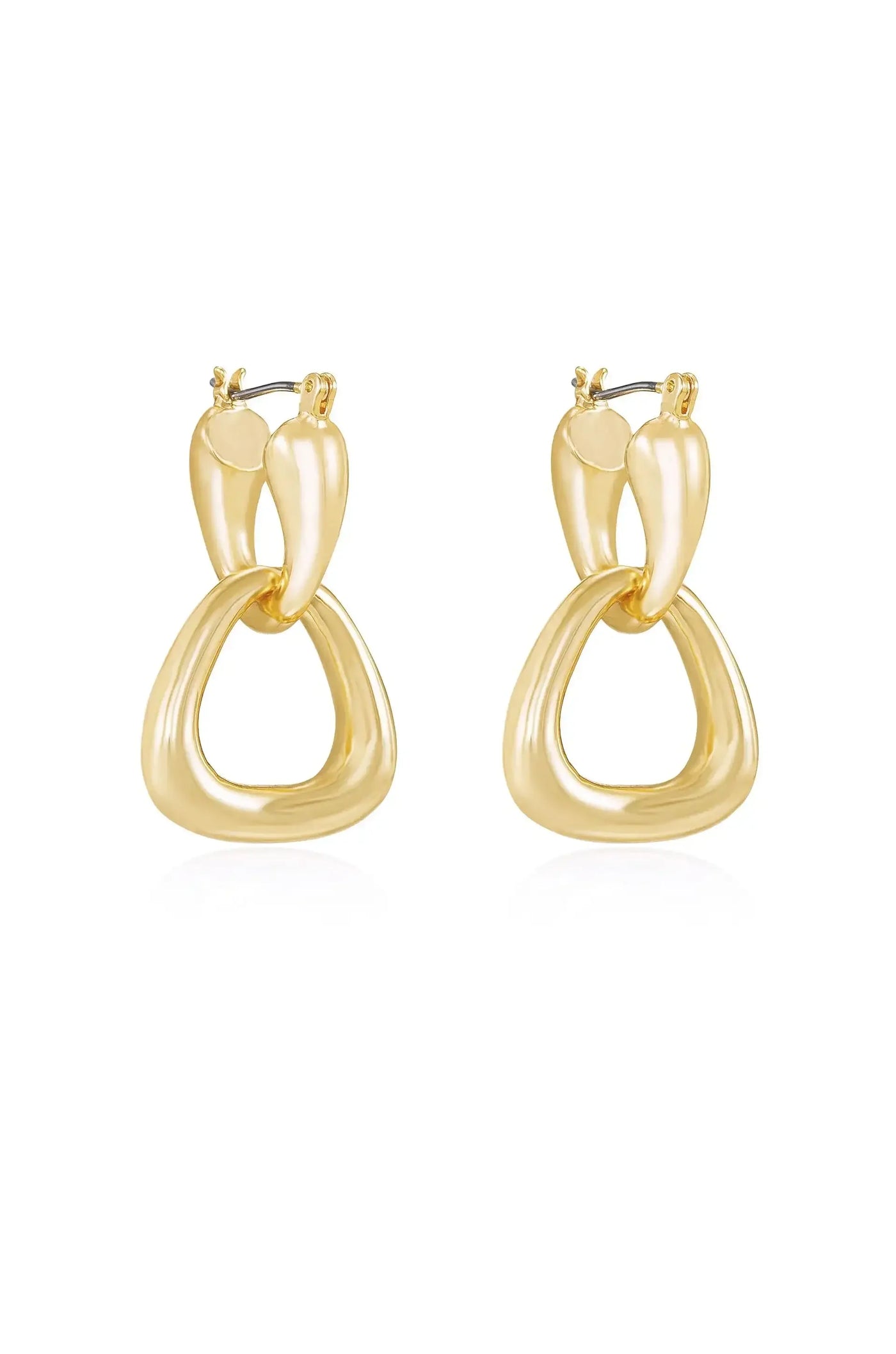 A pair of elegant gold earrings showcases a unique design, featuring interlocking shapes. They hang gracefully, reflecting light in a simple, clean setting.