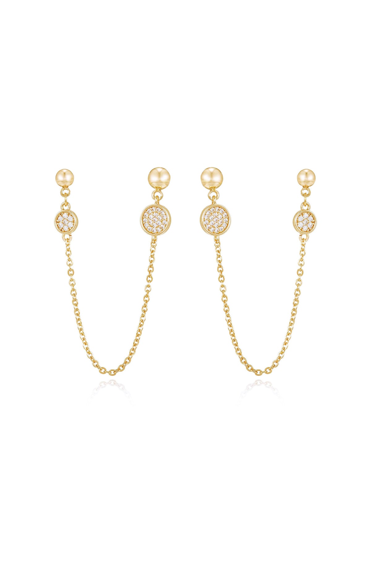 Gold earrings featuring two pendants connected by delicate chains. Each pendant has a central round design embellished with sparkling stones, reflecting light against a plain white background.