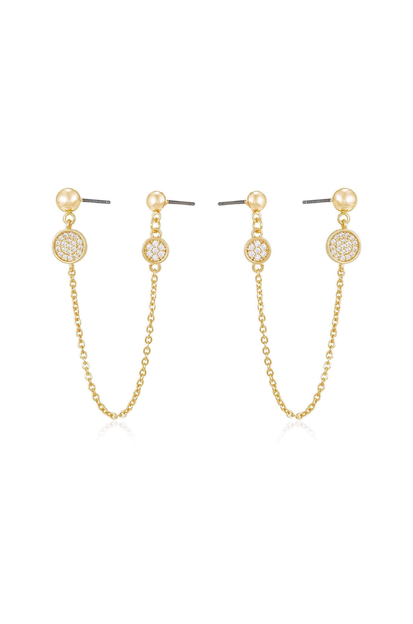 Two pairs of gold dangle earrings rest side by side. Each features a circular component with sparkling details, connected by a delicate chain to a spherical top, showcasing elegance against a simple background.