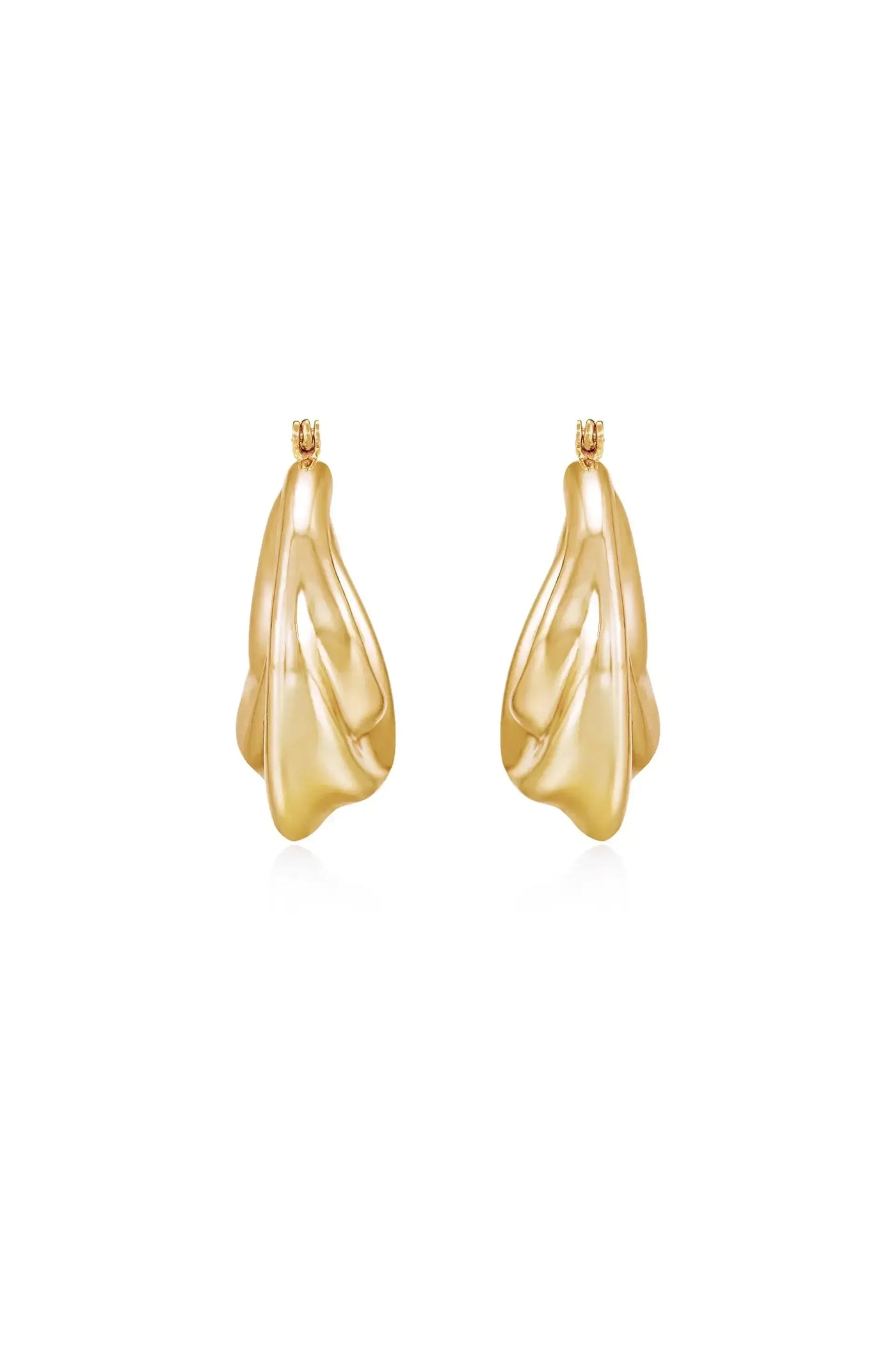 Two gold-colored earrings, shaped like flowing petals, are displayed side by side. They shimmer against a clean, white background, showcasing their elegant design.