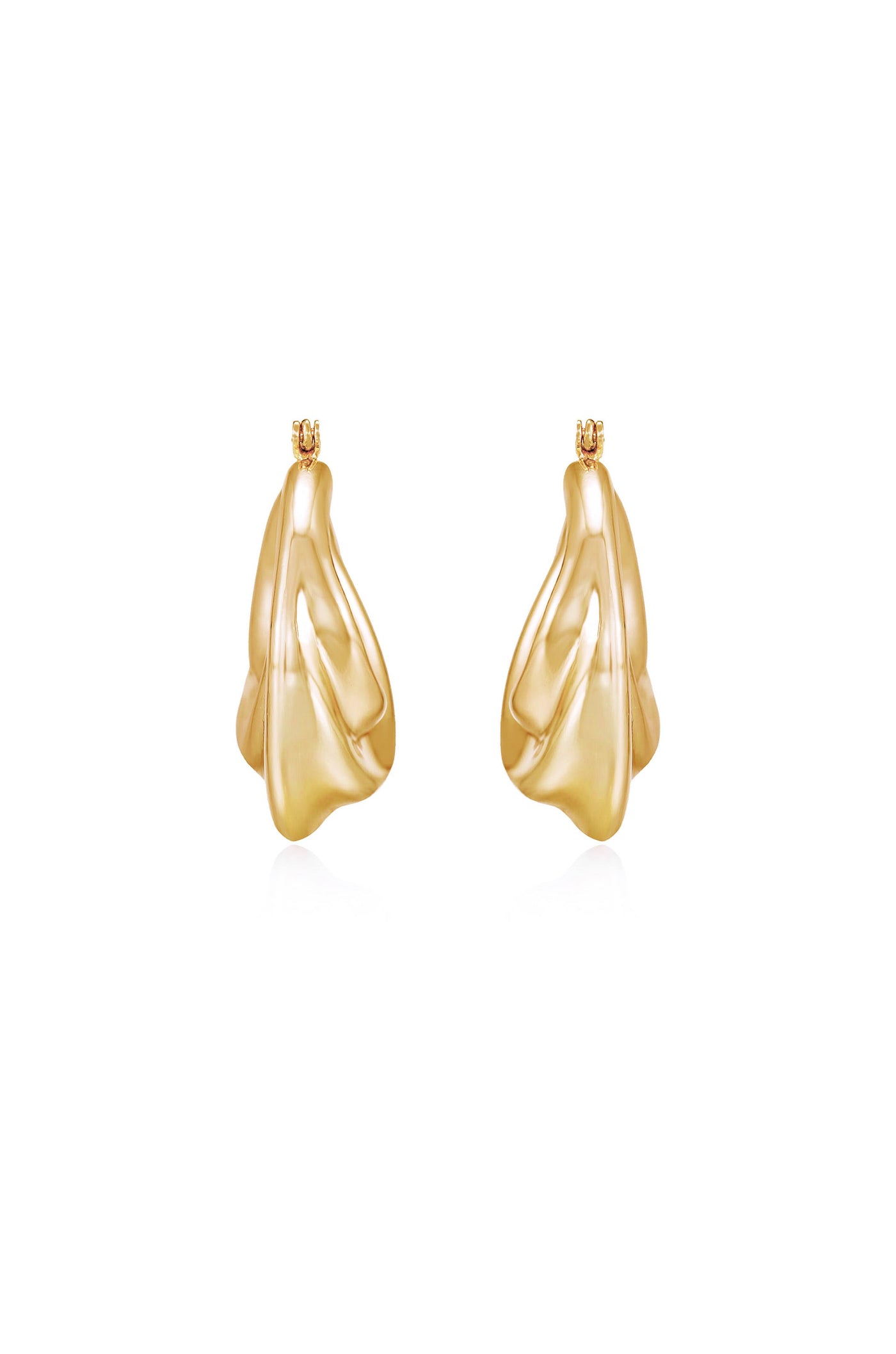Two gold-colored earrings, shaped like flowing petals, are displayed side by side. They shimmer against a clean, white background, showcasing their elegant design.