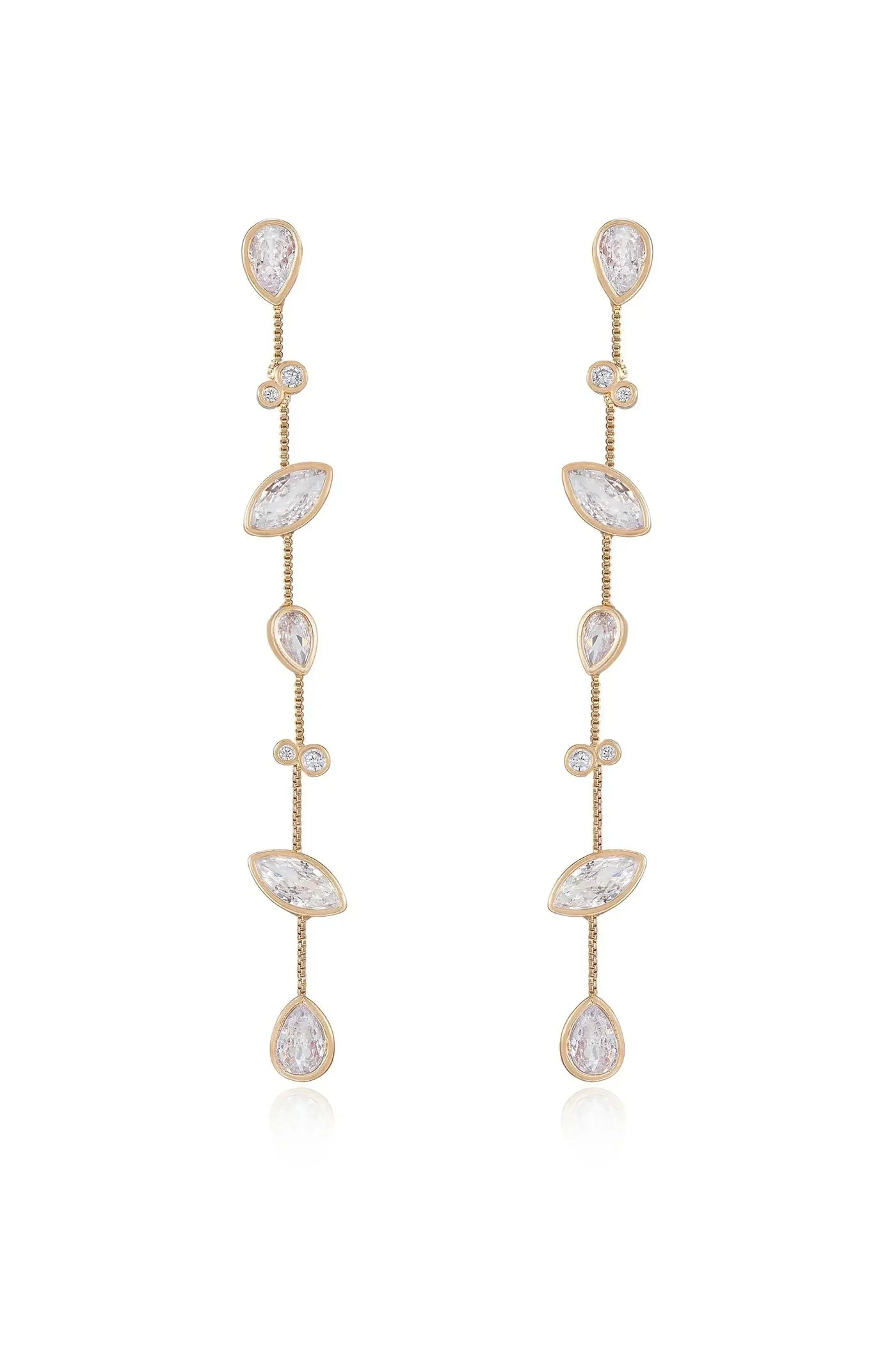 Dazzling gold earrings feature a series of shimmering gemstones arranged in a vertical design, creating an elegant, cascading effect against a neutral background.