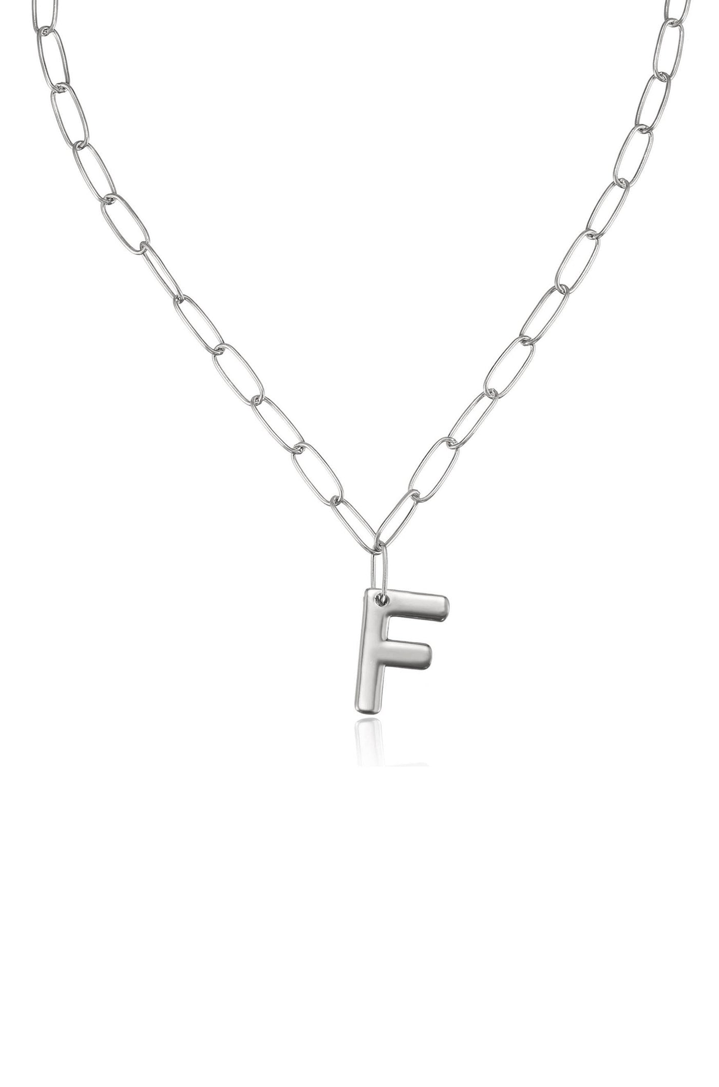 A silver chain necklace features an uppercase "F" pendant, hanging centrally. The background is plain white, emphasizing the simplicity and elegance of the piece.