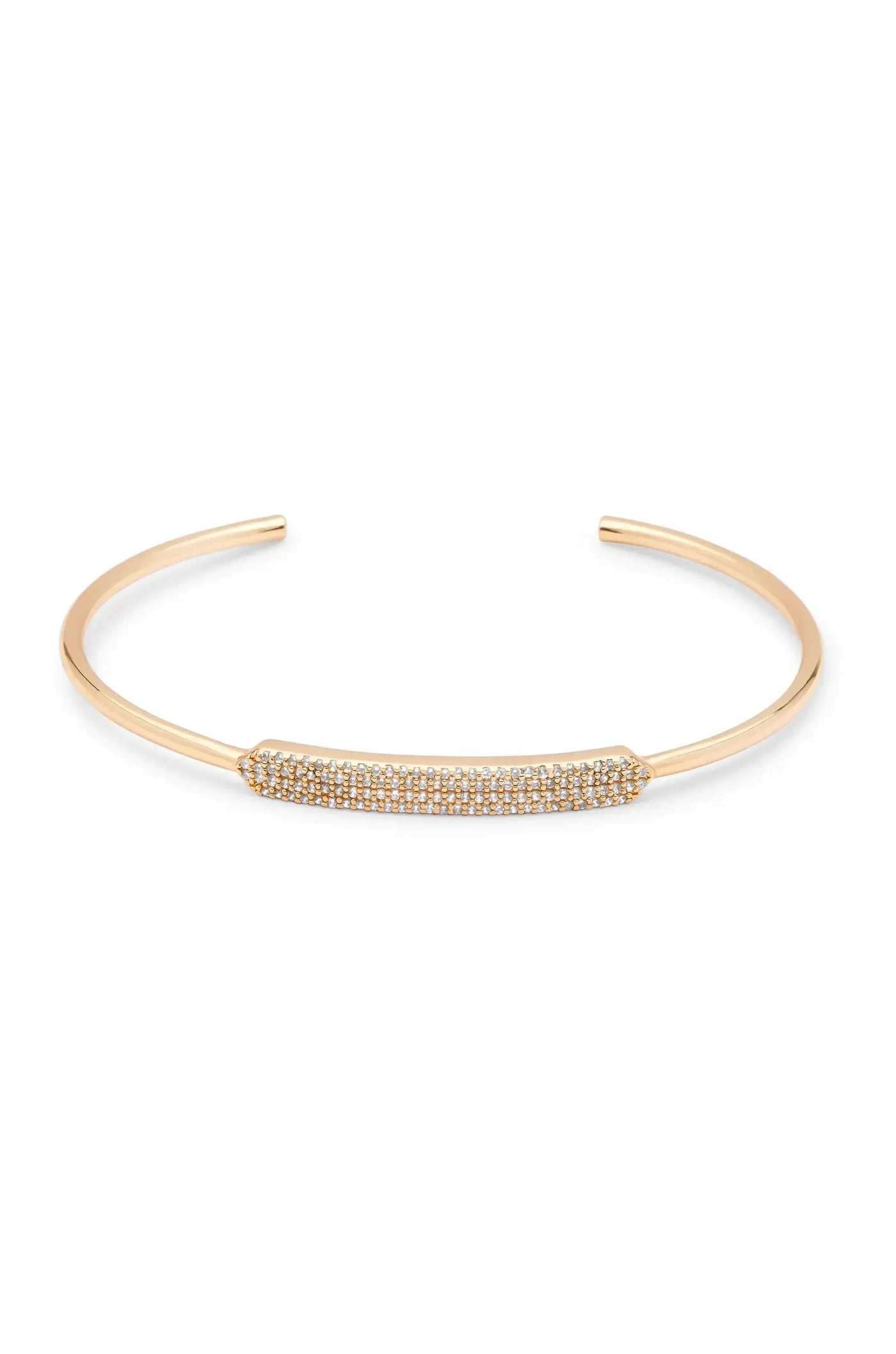 A gold cuff bracelet featuring a central horizontal bar embedded with small sparkling stones. It is placed against a plain white background, highlighting its elegant design.