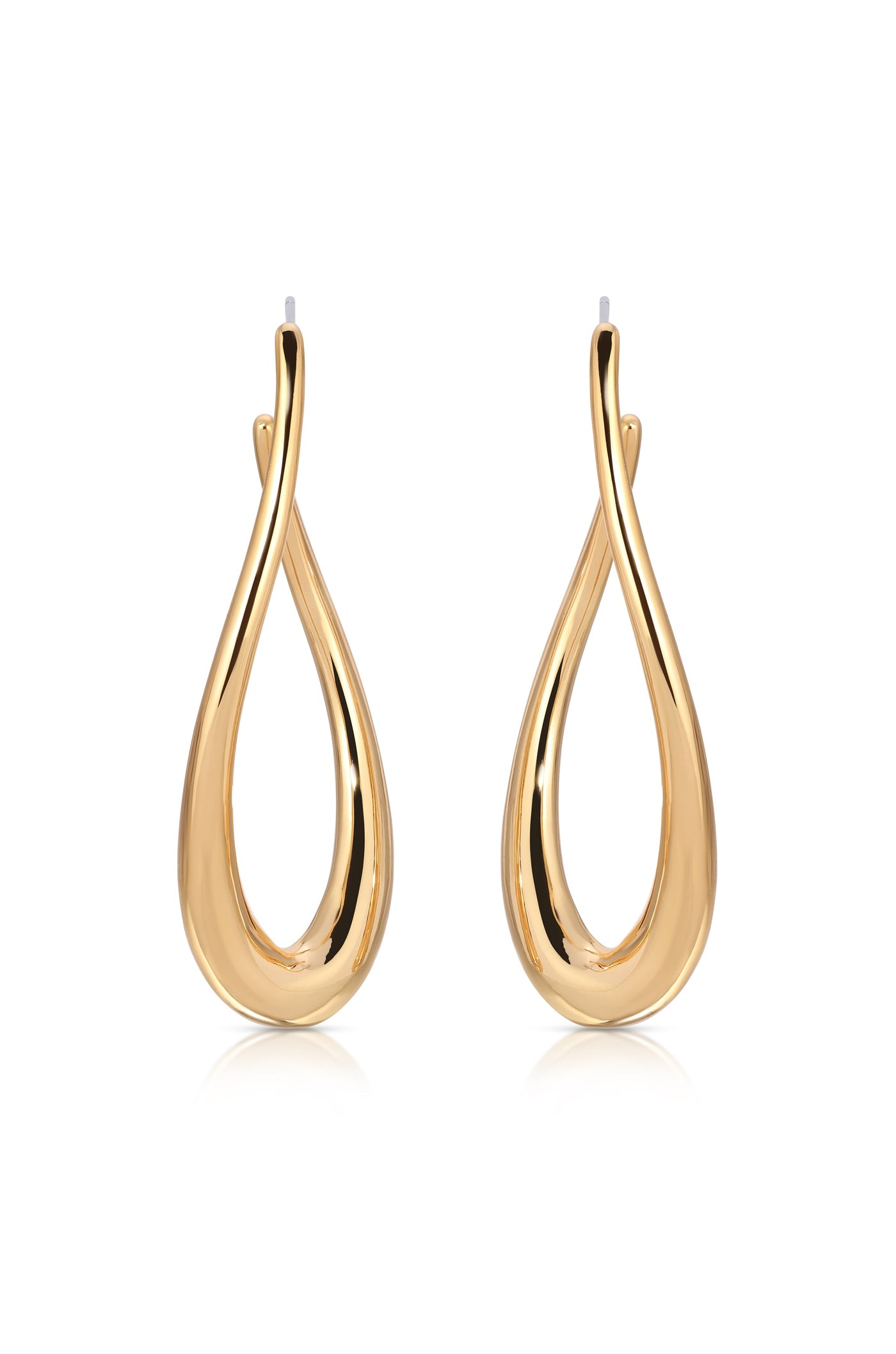 Gold hoop earrings are displayed side by side, showcasing a smooth, teardrop shape with a twisting design. They rest against a reflective surface, enhancing their shiny finish.