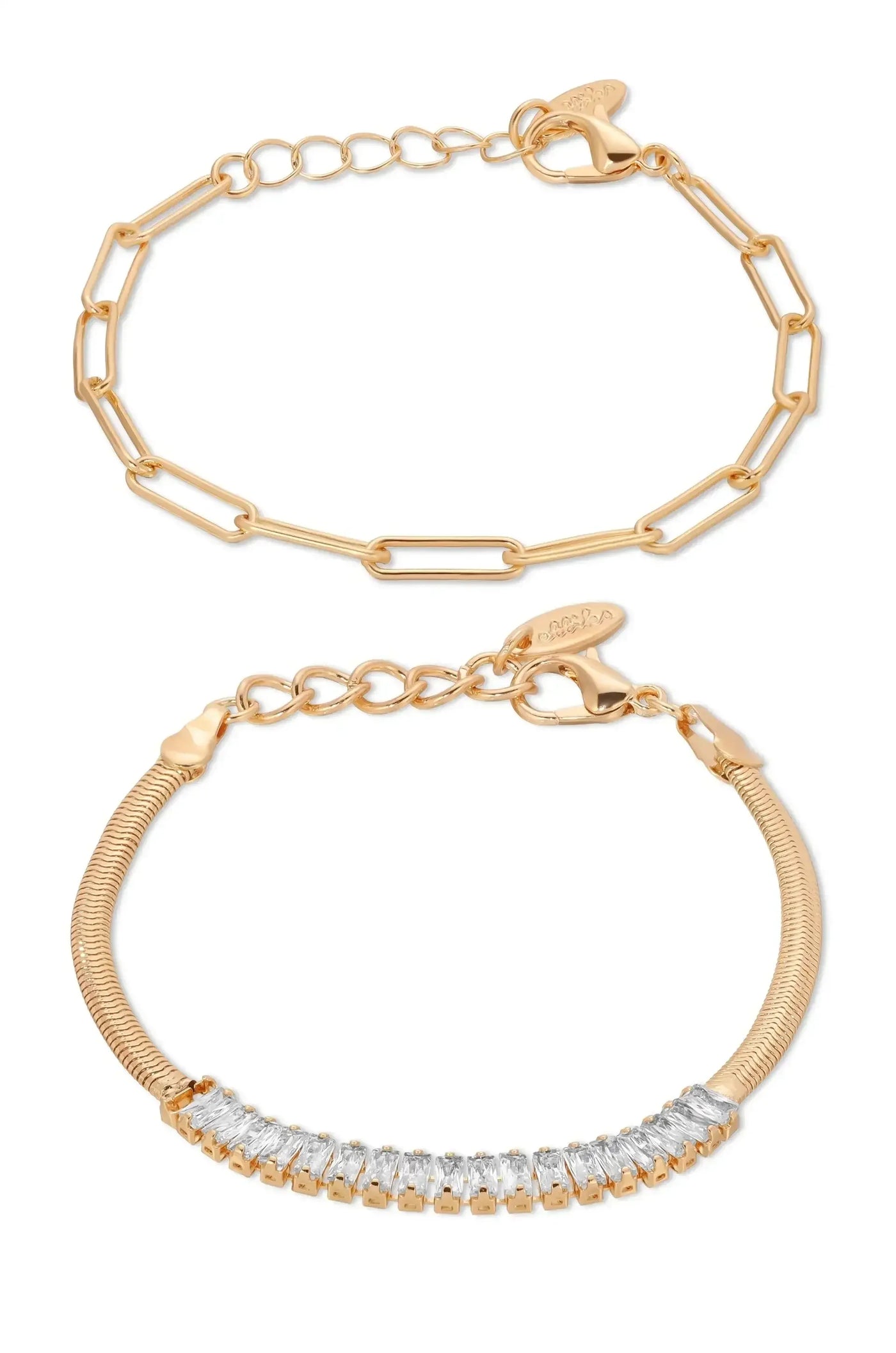 Two gold bracelets are displayed. The top bracelet features elongated, linked chains, while the bottom has a smooth, flexible design adorned with sparkling clear gemstones, both secured with clasps.