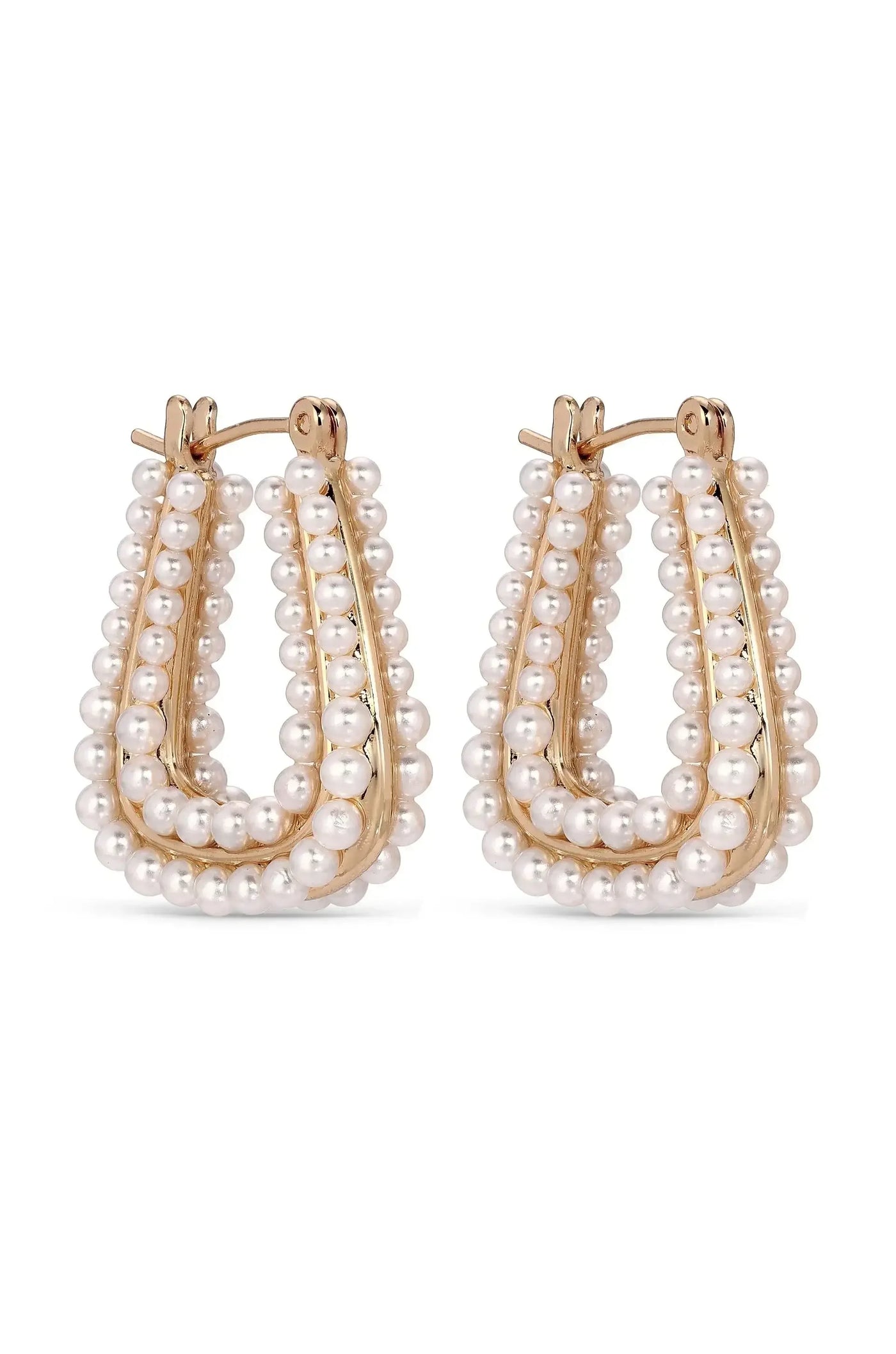 A pair of gold-tone hoop earrings adorned with multiple white pearls, elegantly arranged in a curved design. The earrings appear polished and sophisticated, suitable for formal or casual attire.