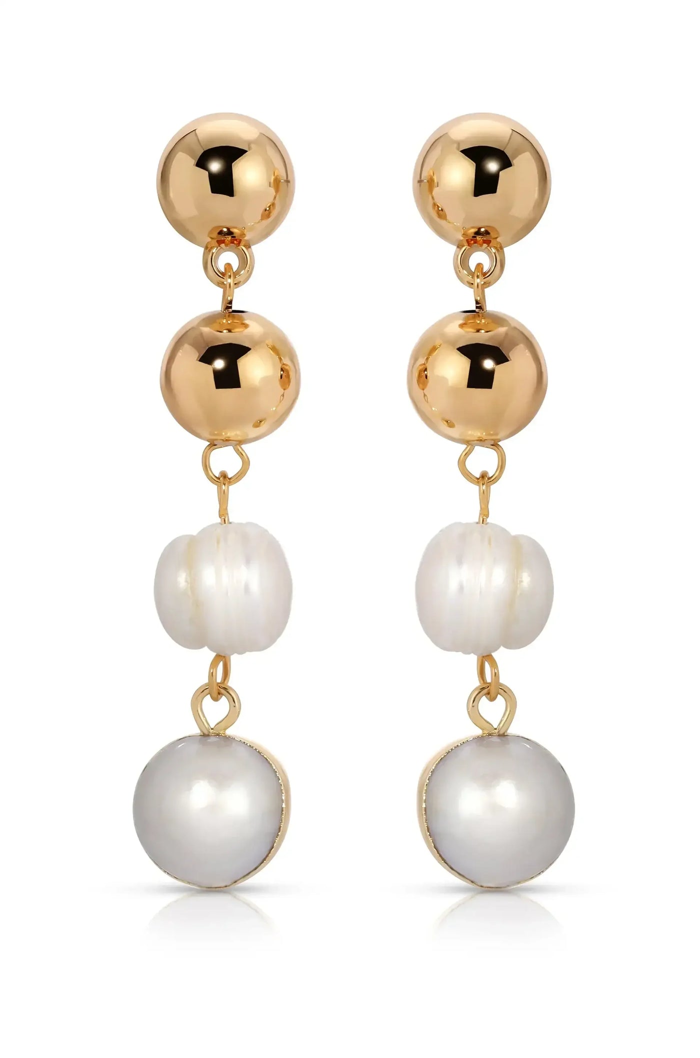 Dangling earrings feature three elements: a shiny gold sphere at the top, a white shell-like bead in the middle, and a silver-hued round bead at the bottom. They are displayed against a plain white background.