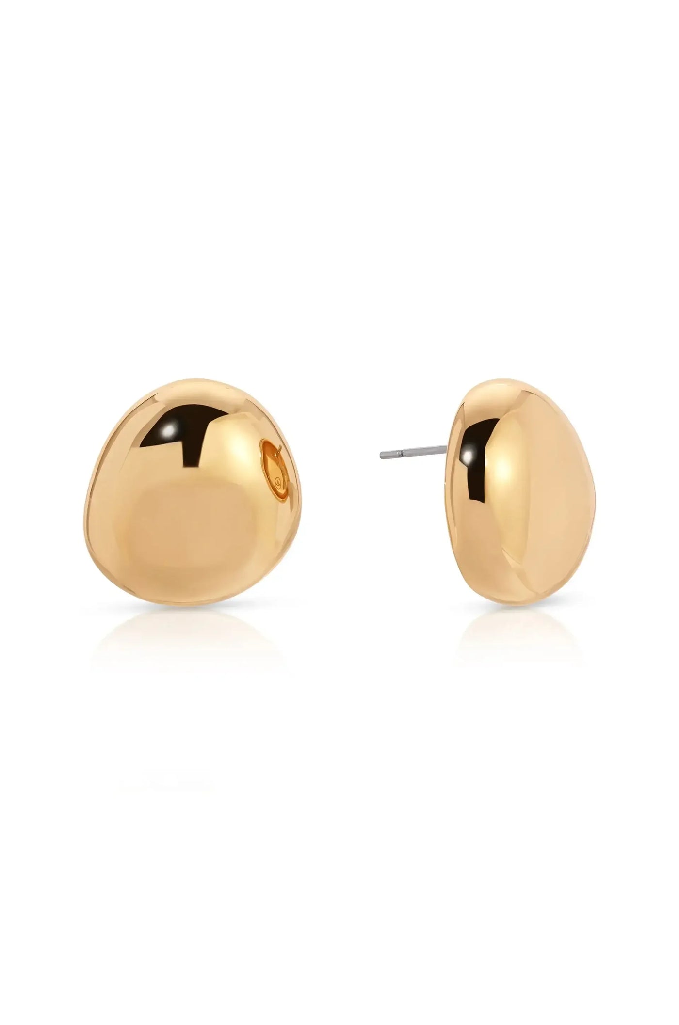 Gold earrings, smooth and rounded in shape, rest beside each other on a white surface, reflecting light and showcasing their polished finish, ready to be worn.