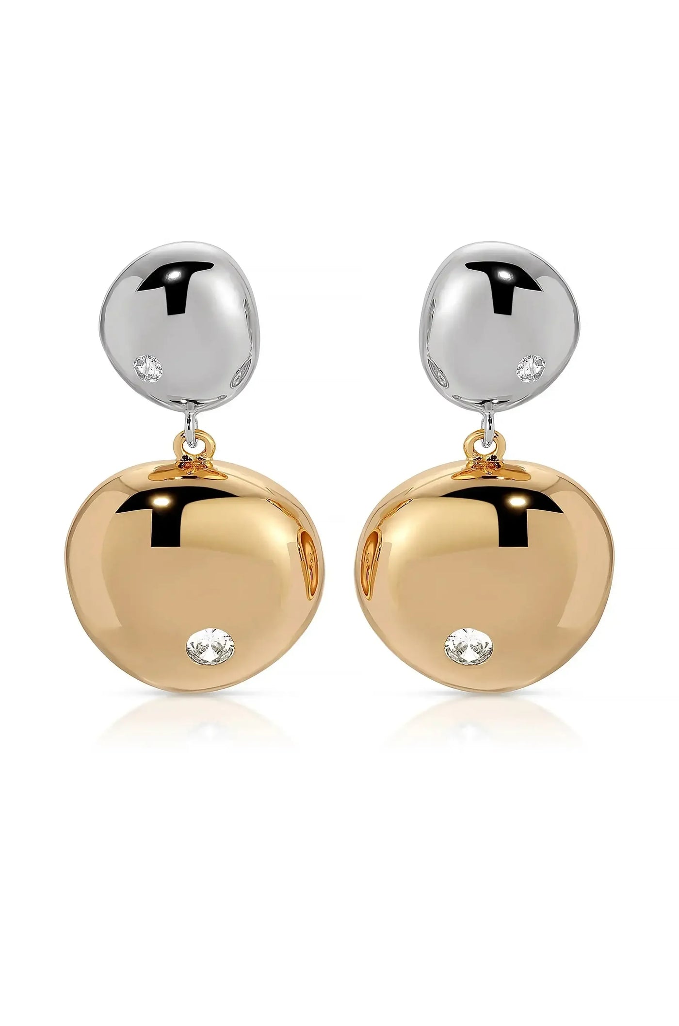 Earrings hang elegantly, featuring a shiny silver top and a larger, polished golden drop below, each adorned with a small diamond. They are displayed against a white background.