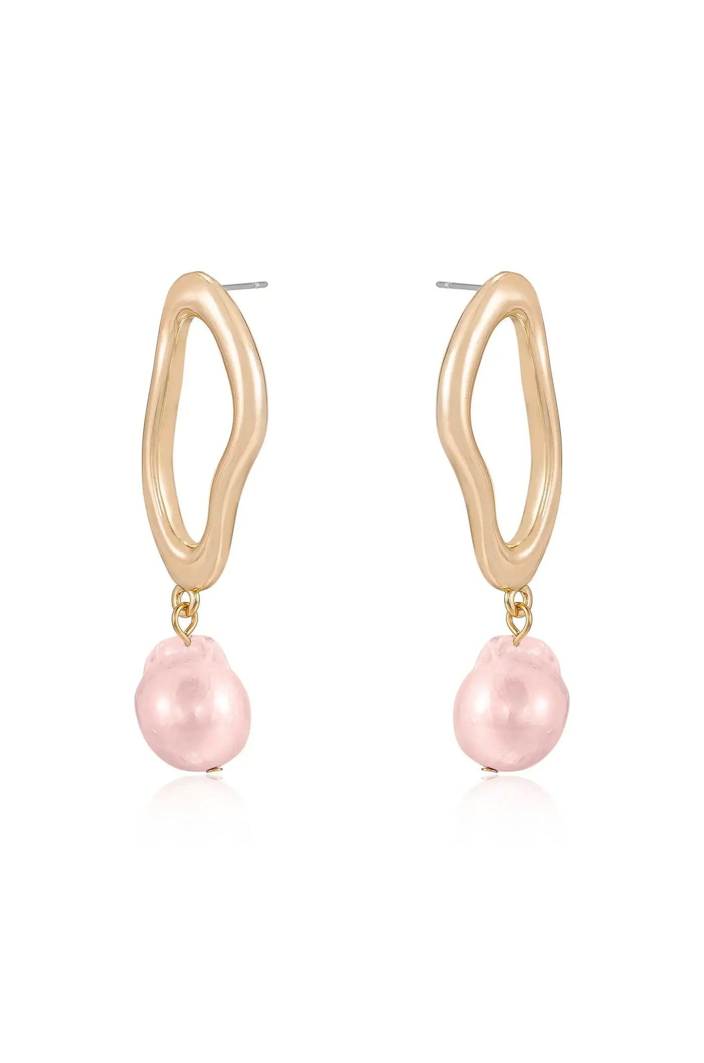 Gold-tone earrings feature an abstract, wavy shape attached to a pink pearl. They are displayed on a white background, emphasizing their shine and delicate design.