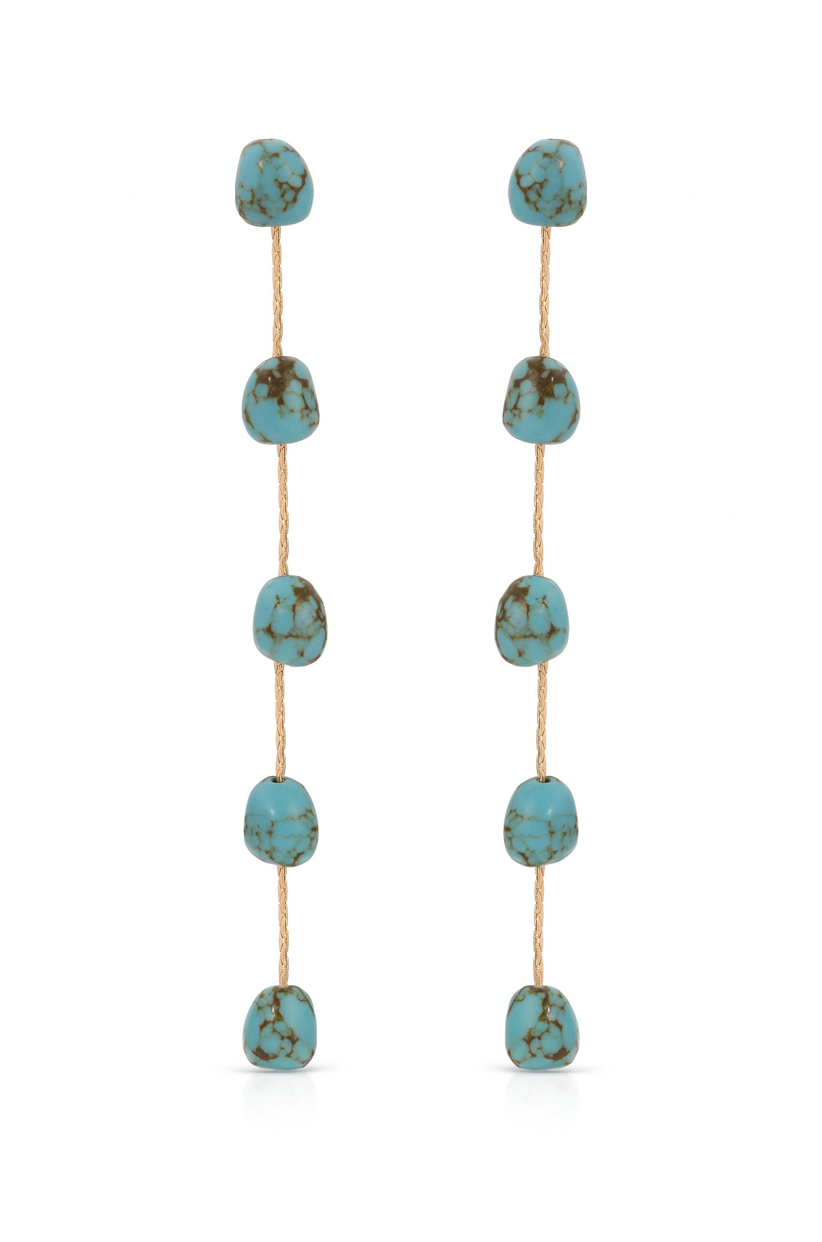 Dangling earrings made of turquoise stones are suspended on thin golden strands, showcasing a repeated pattern. The background is plain and soft, emphasizing the jewelry's color and design.