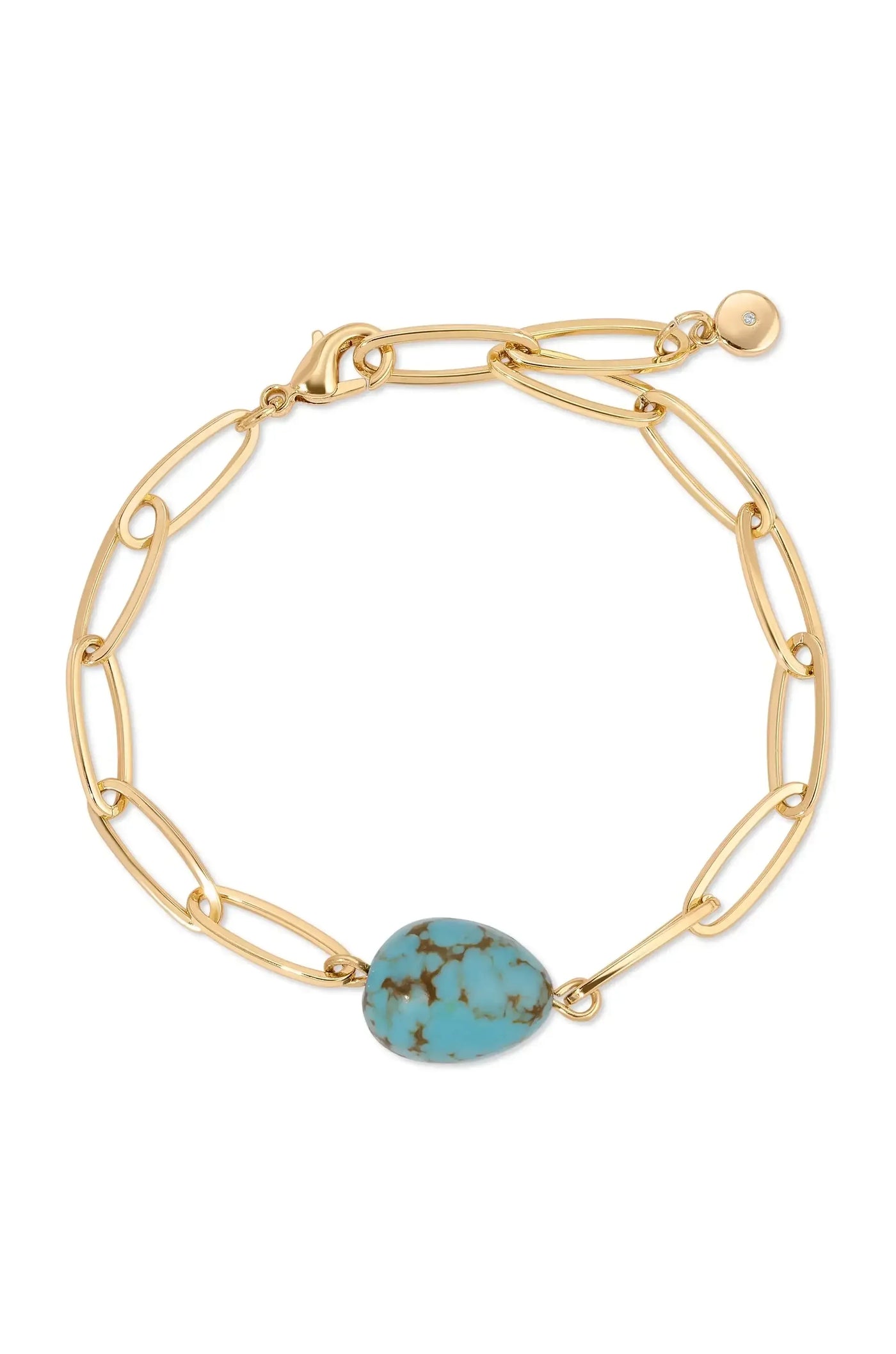 A gold chain bracelet features elongated links and a prominent turquoise stone centerpiece. It is displayed against a plain white background, accentuating the jewelry's design and color contrast.