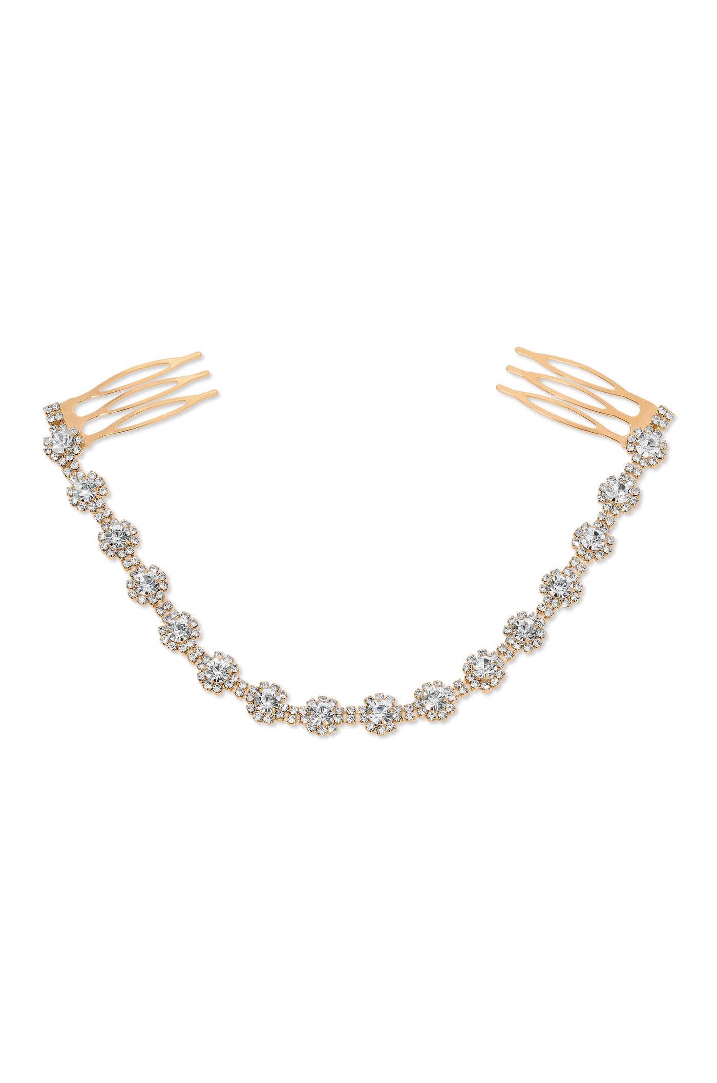 A delicate hair ornament features a series of sparkling rhinestones arranged as flowers, attached to golden comb-like prongs for securing in hair, set against a white background.